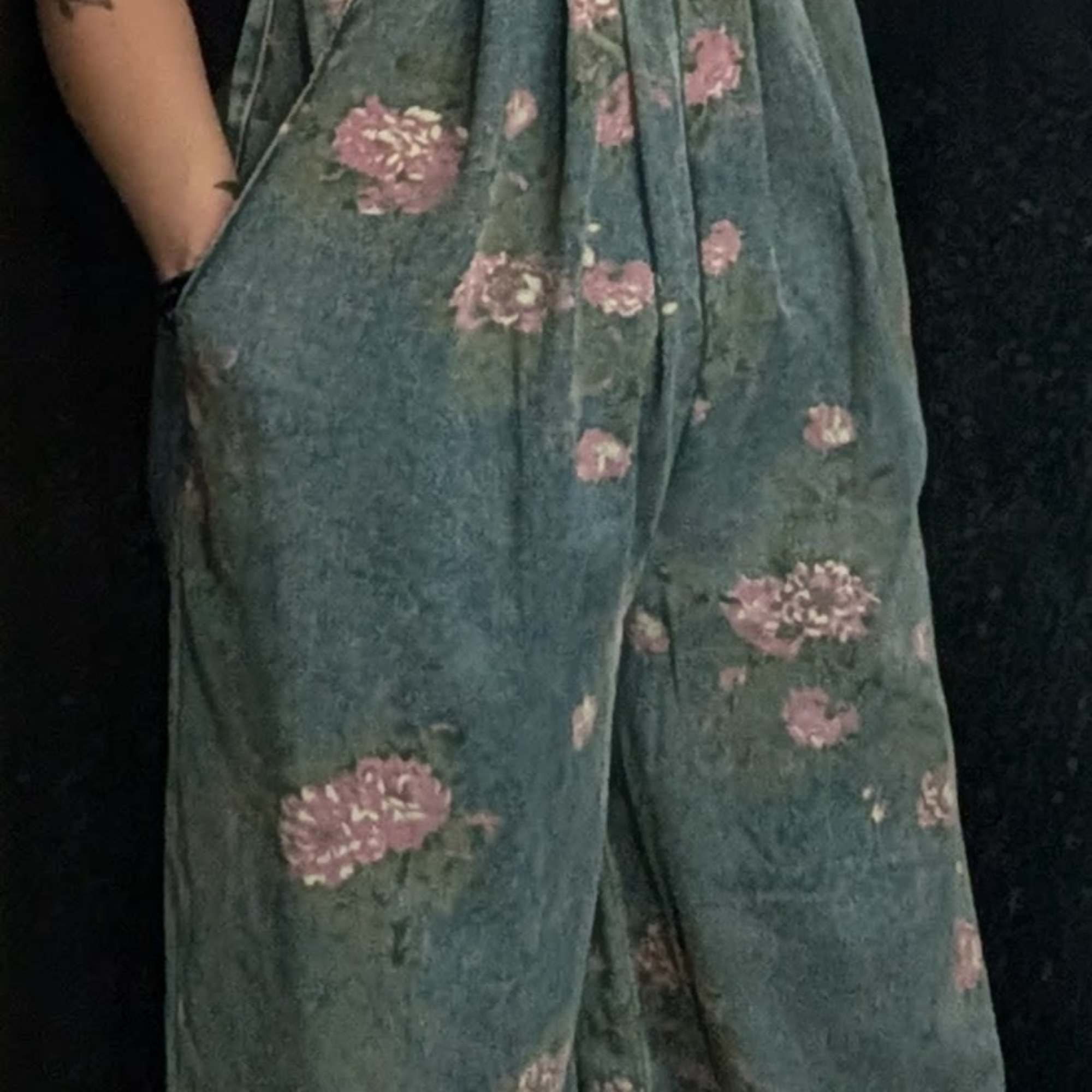 Oversized flare leg denim overalls with a front pouch, a back pocket