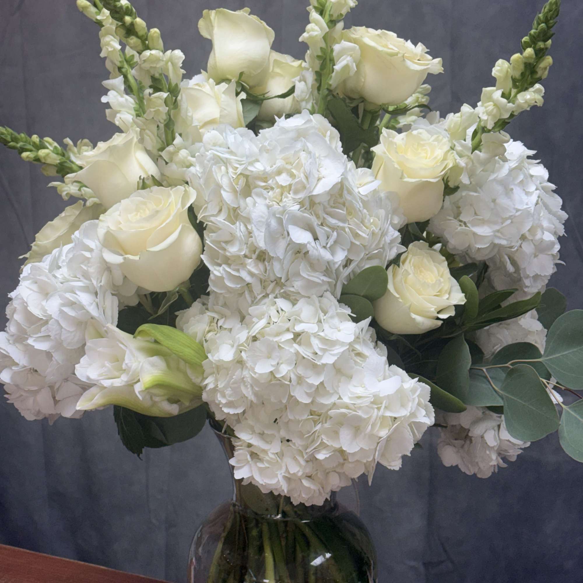 Pure Serenity is a graceful arrangement of white lilies , white roses, photo 2 of 2