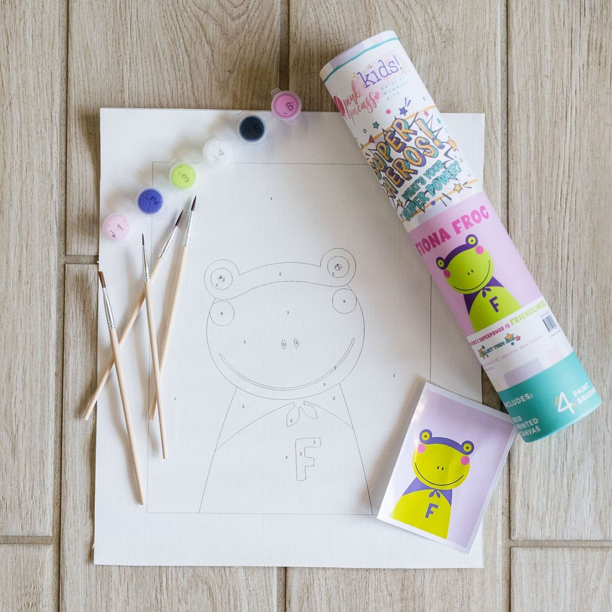 Paint-by-number frog canvas with brushes and paint pots