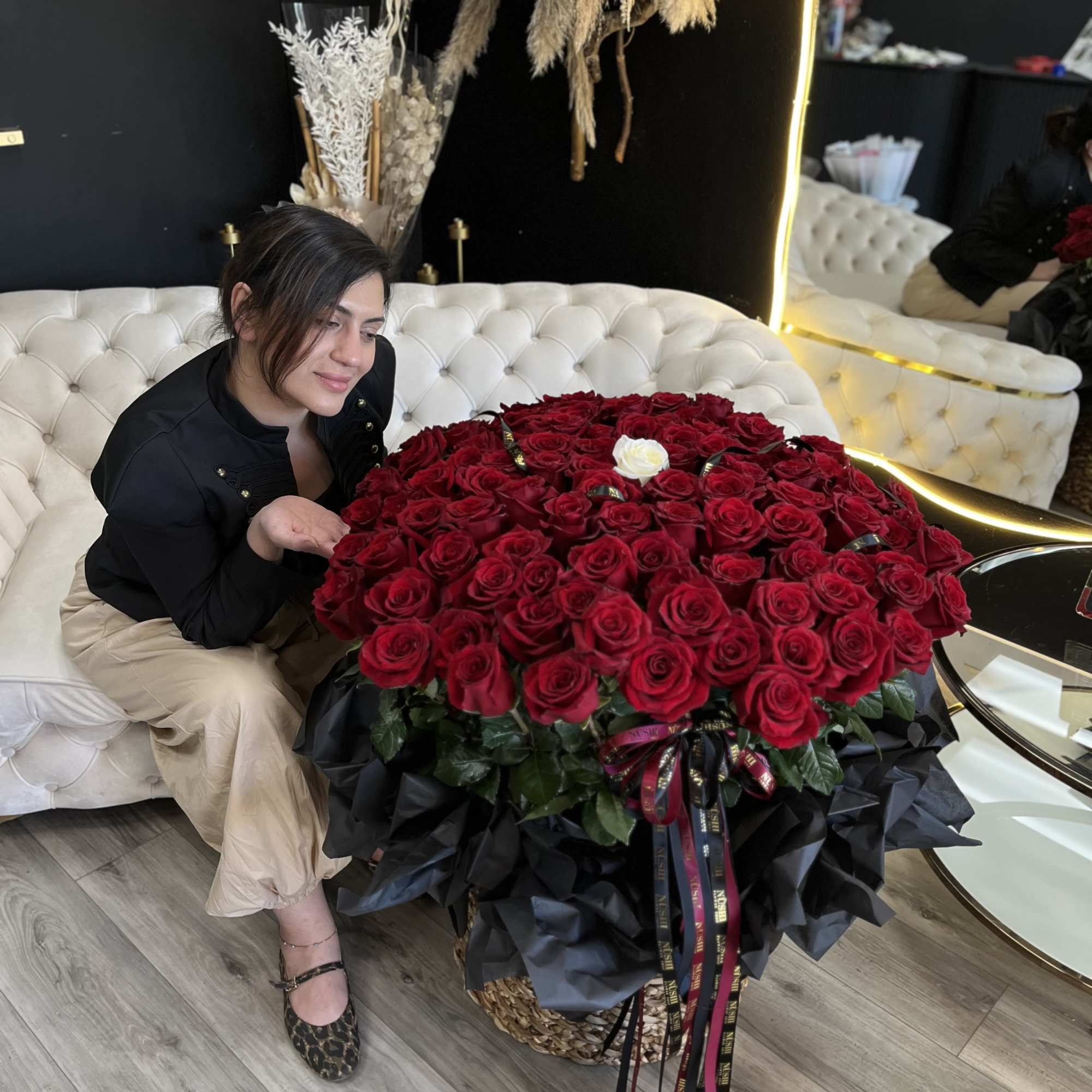 101 roses. And elegant basket with one white rose, styled for weddings