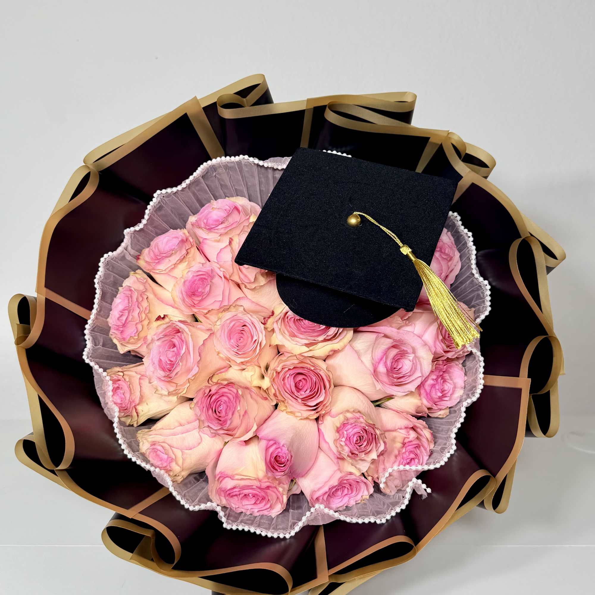 Celebrate their achievement with flowers as memorable as the moment. Designed with