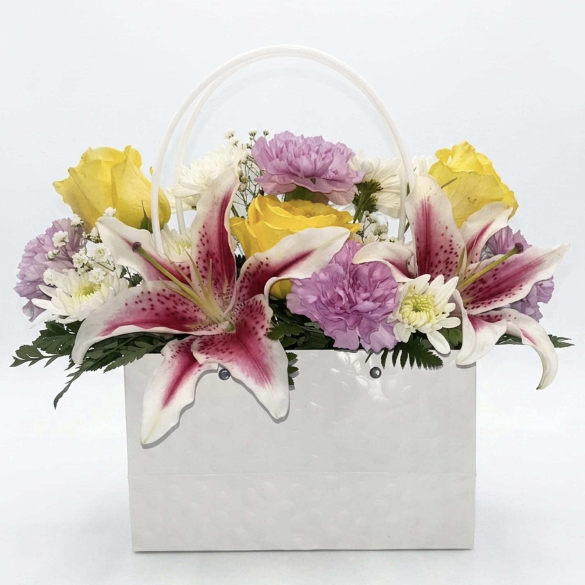 Blooming Gift Designer&rsquo;s Choice is a custom-made floral arrangement featuring a seasonal