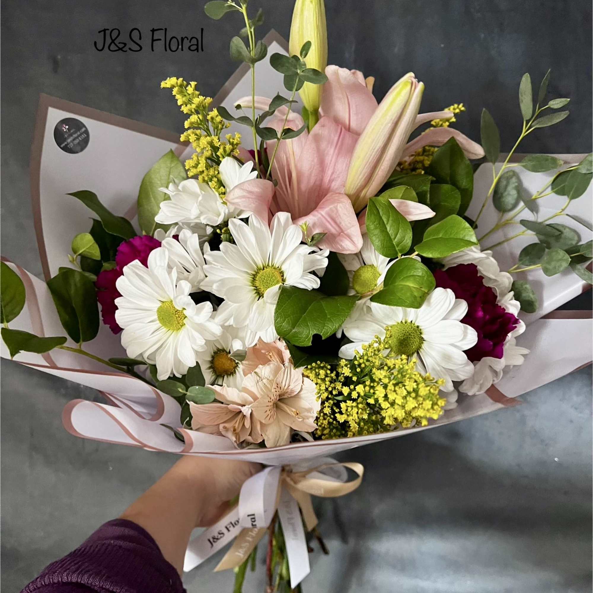 introducing Our New Design Luna hand tied bouquet, beautifully arranged with lilies
