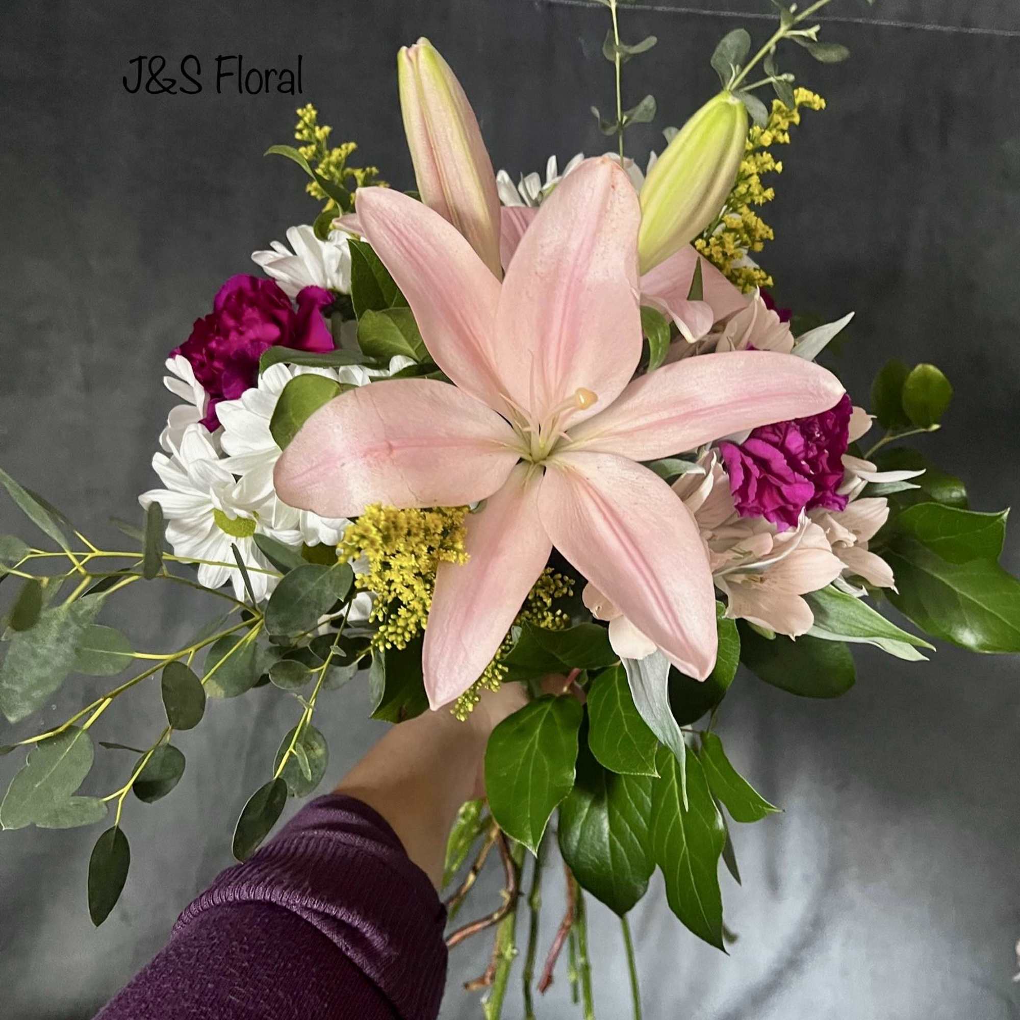 introducing Our New Design Luna hand tied bouquet, beautifully arranged with lilies