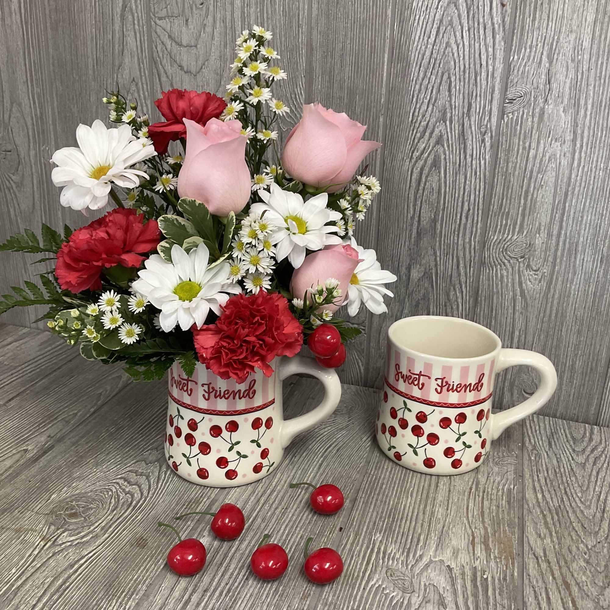 This cheerful, cherry themed arrangement really pops! Comes in an adorable keepsake