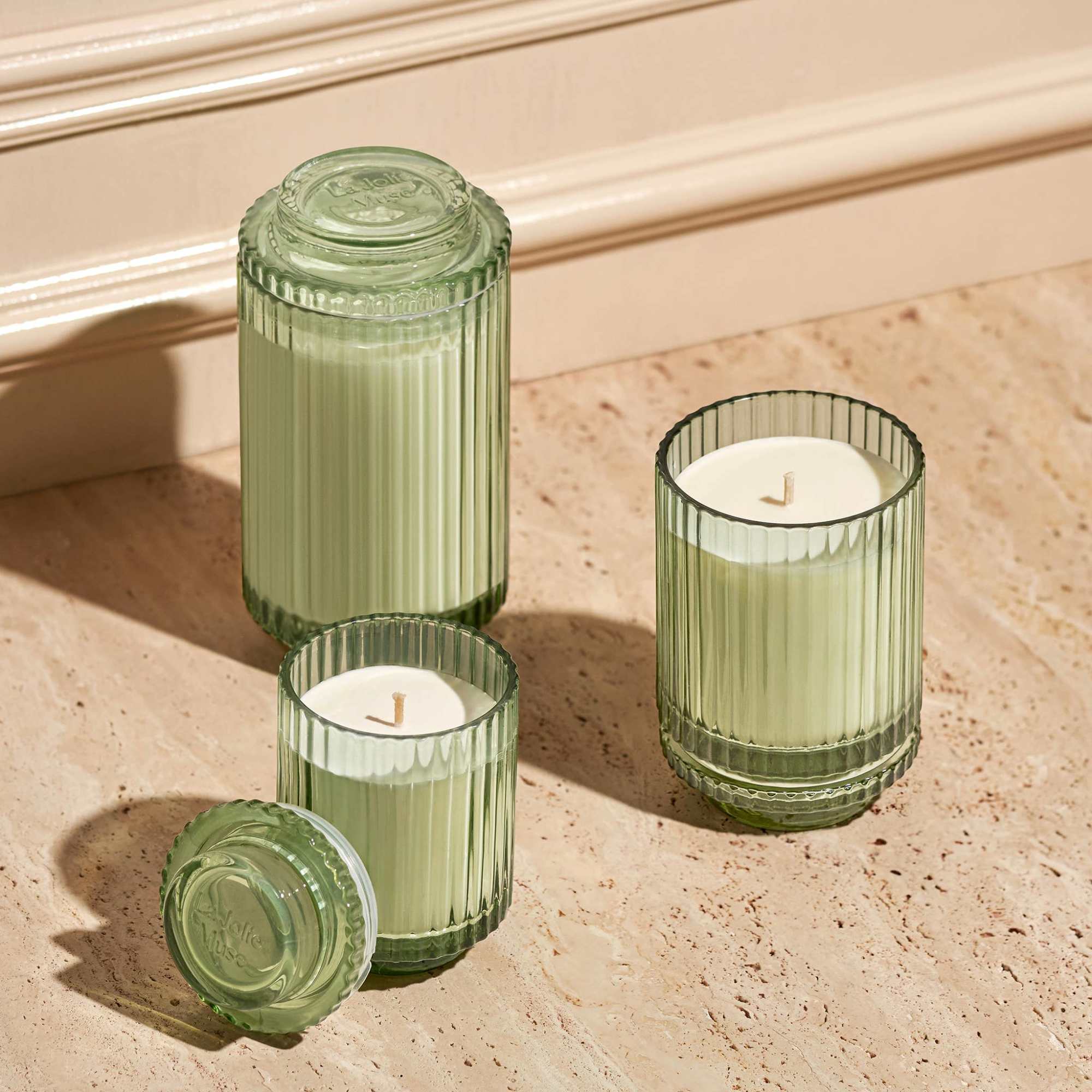 Elevate your space with Am&eacute;lie: Timeless ribbed glass candles, reminiscent of the