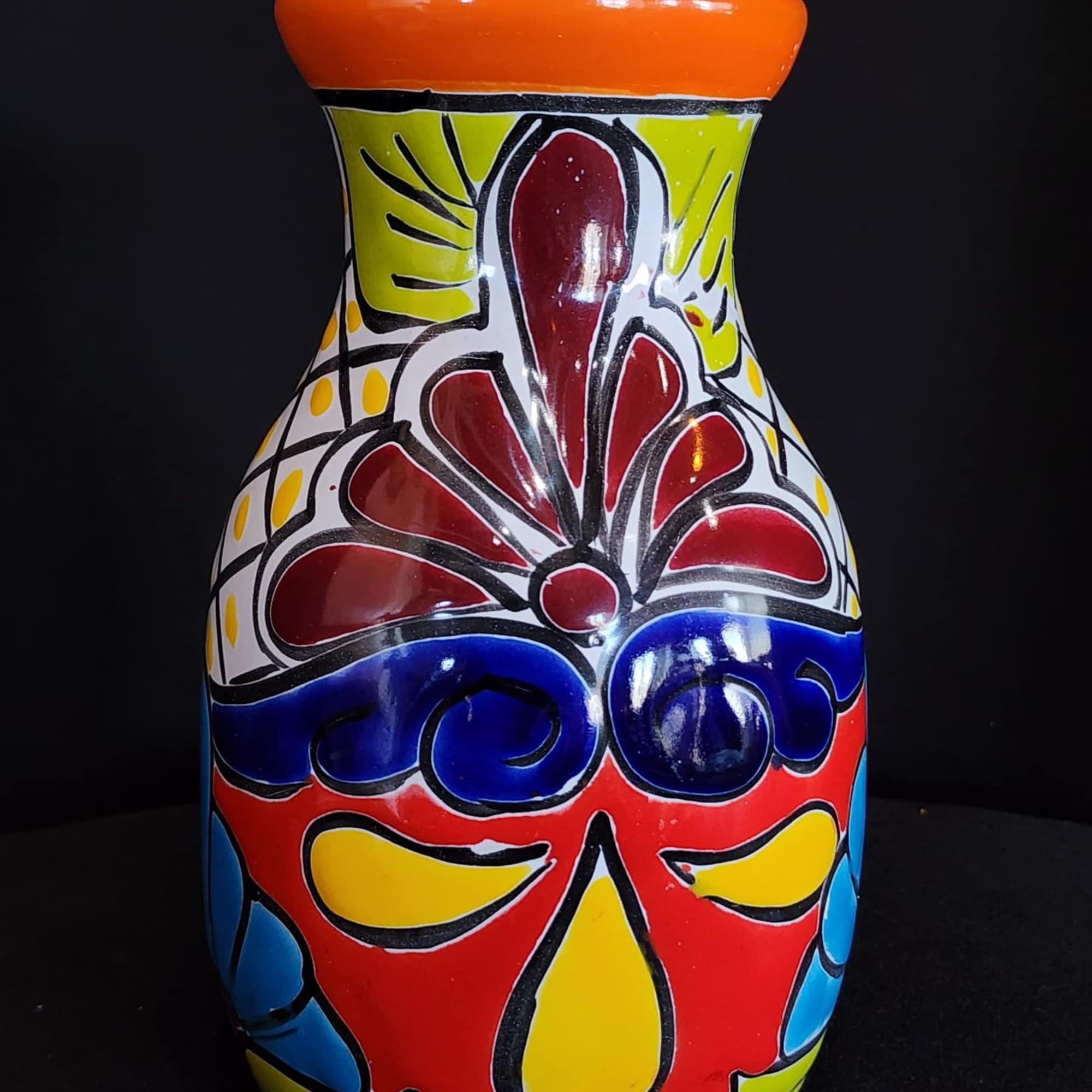 This arrangement represents the beautiful flower colors of Mexican culture and traditions