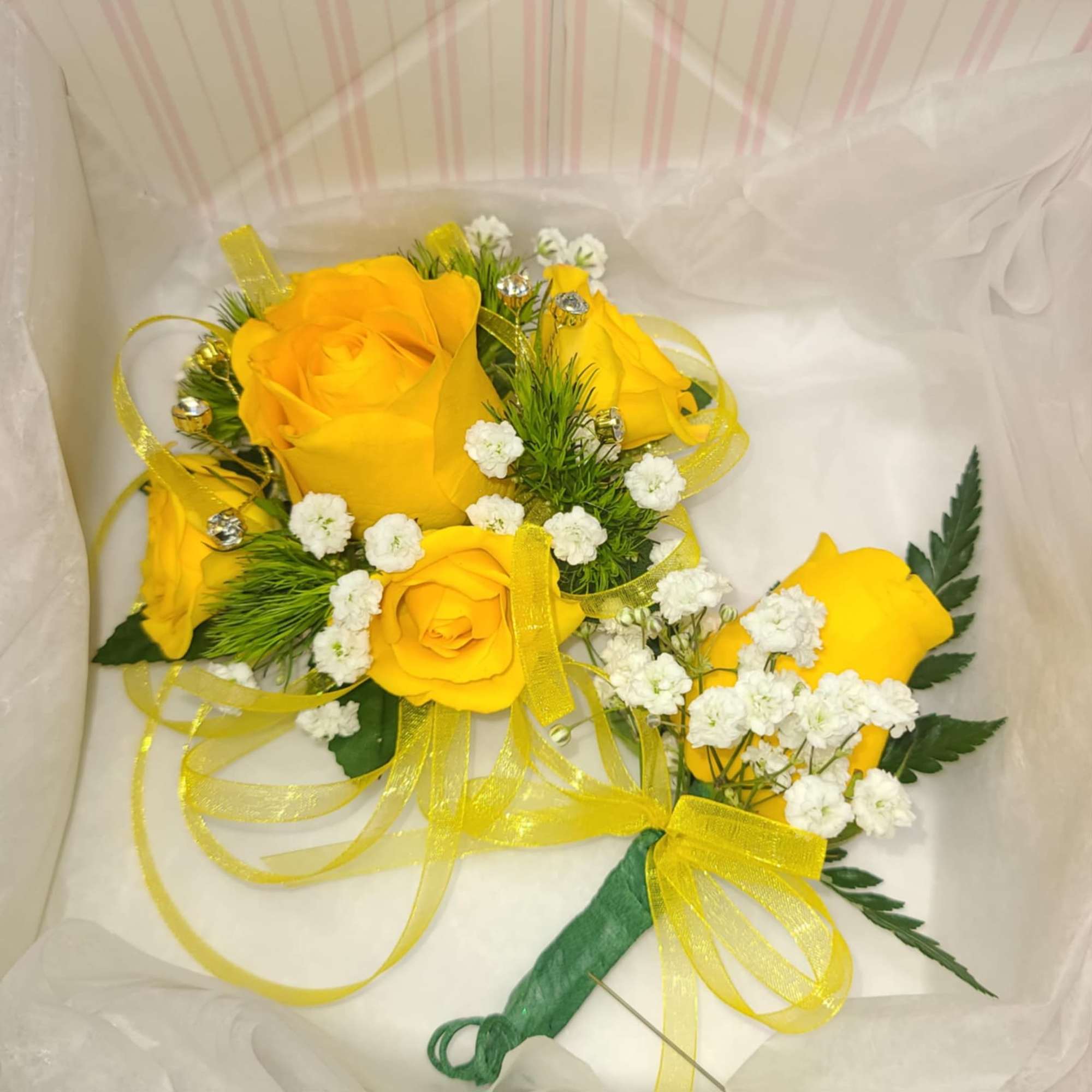 Brighten up your special occasions with our stunning Sunny Delight Wrist Corsage.
