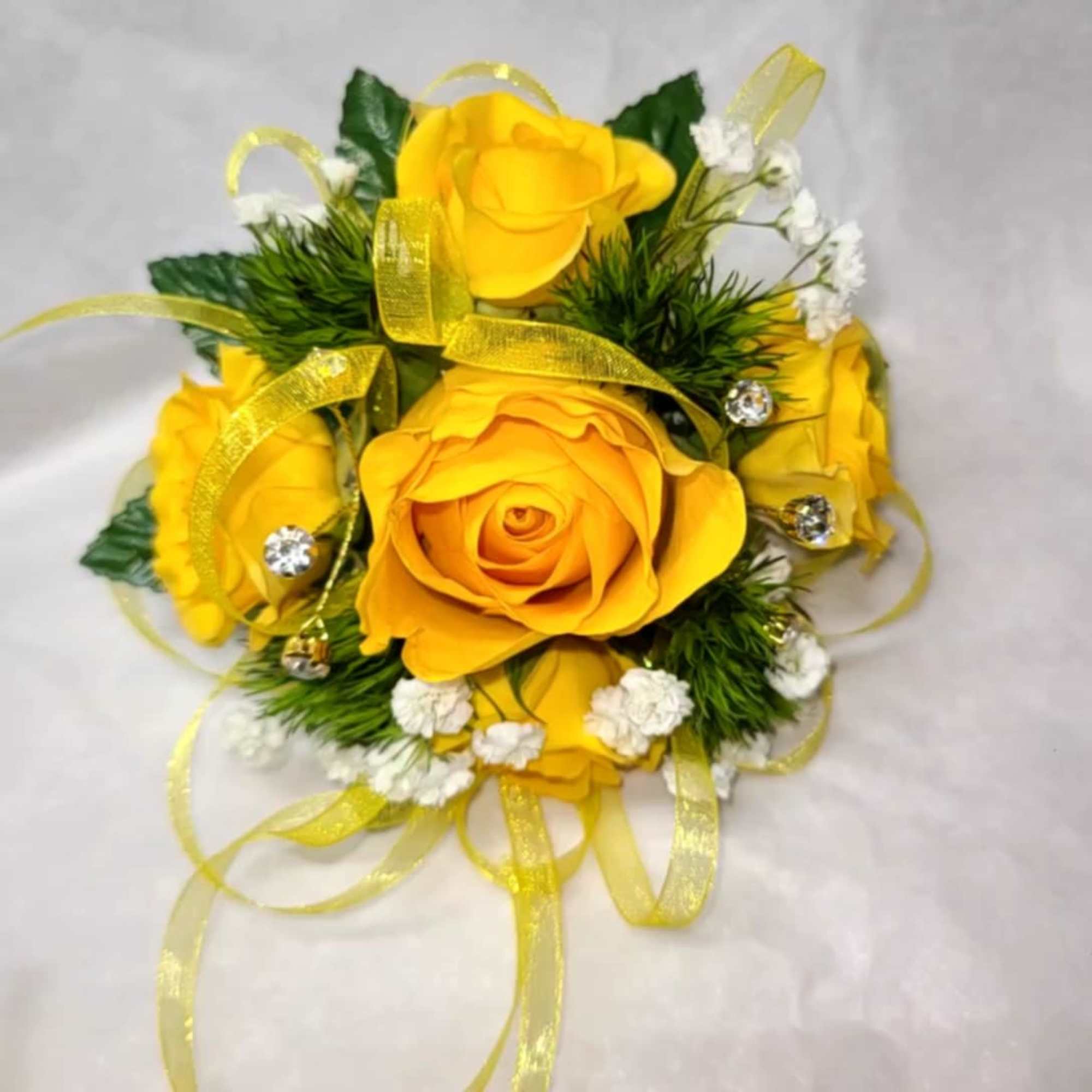 Brighten up your special occasions with our stunning Sunny Delight Wrist Corsage.