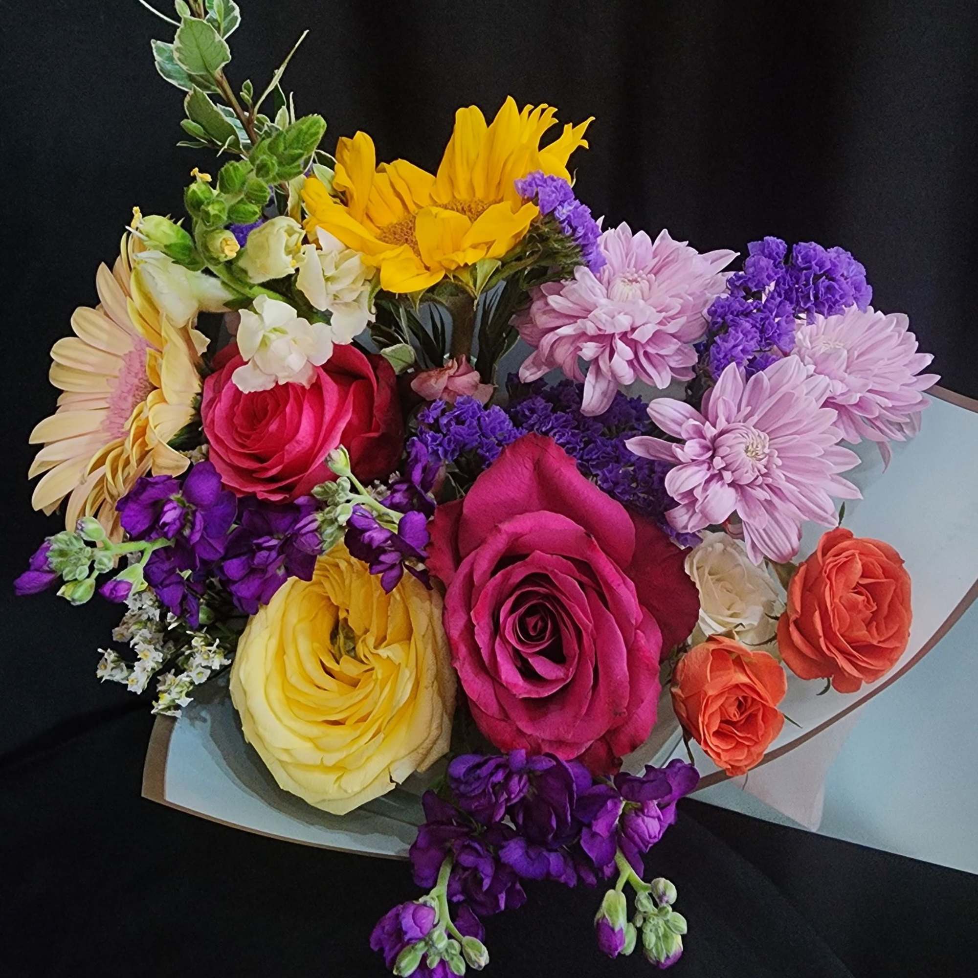 When you have enough vases at home....send a wrapped bouquet of seasonal