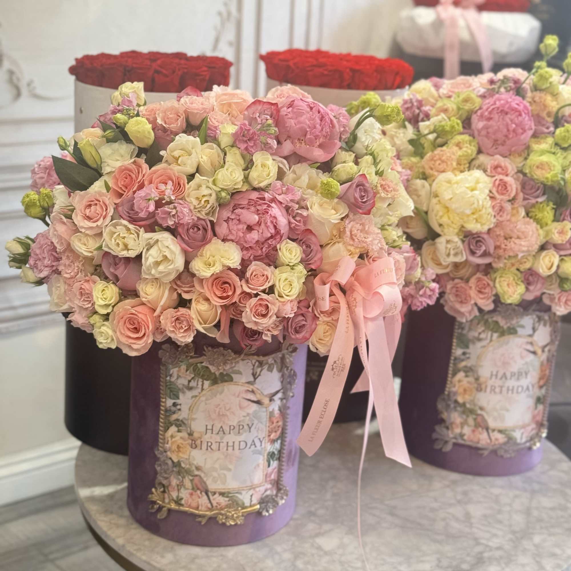 Beautiful mix flowers bouquet in a lavender box