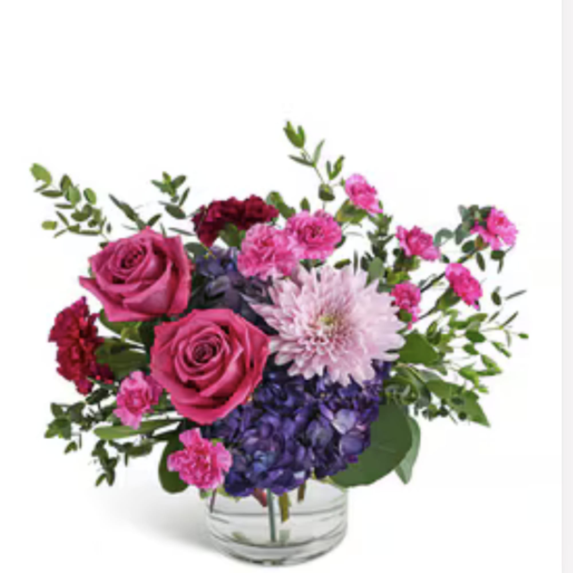 Two large pink roses set the tone in this Magenta Magic bouquet-an