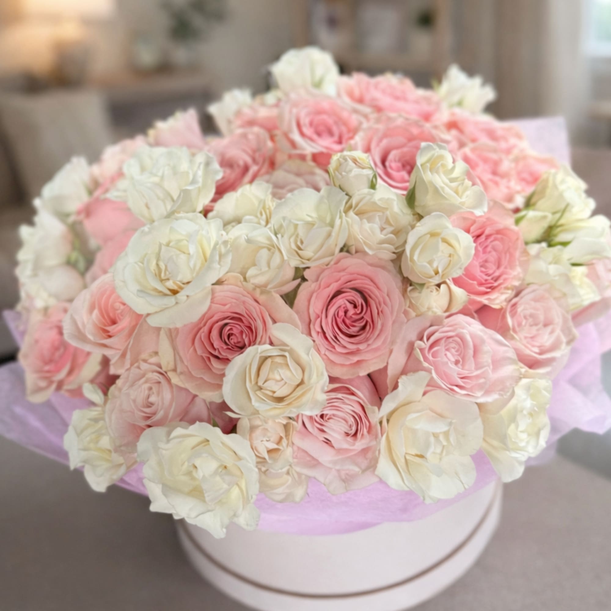 A floral box designed in a soft mixed color palette, combining gentle