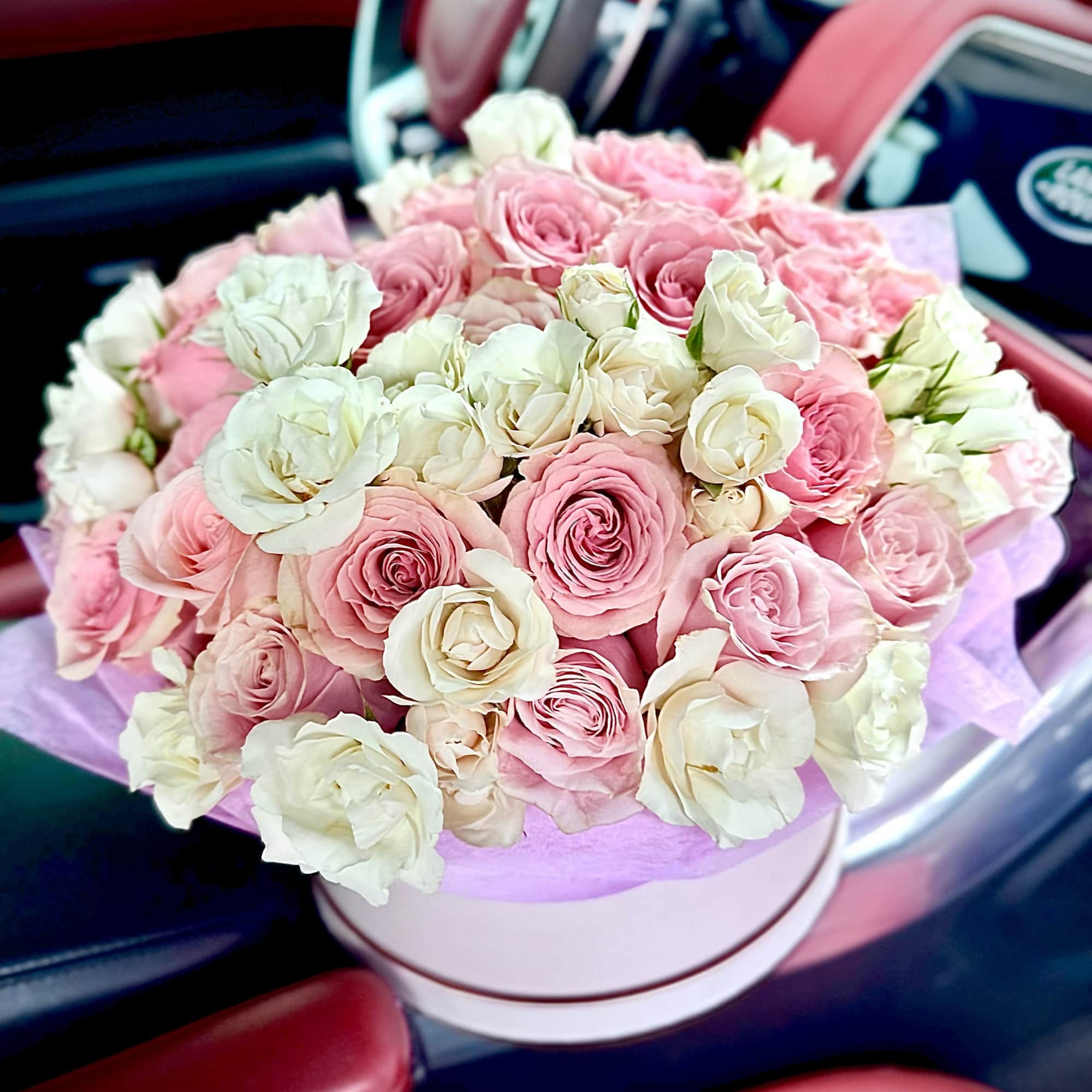 A floral box designed in a soft mixed color palette, combining gentle