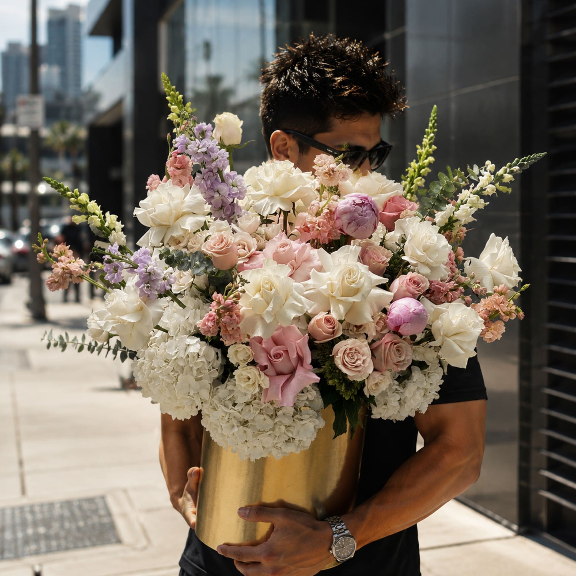 Creamy white hydrangeas and blushing pink roses take center stage in this