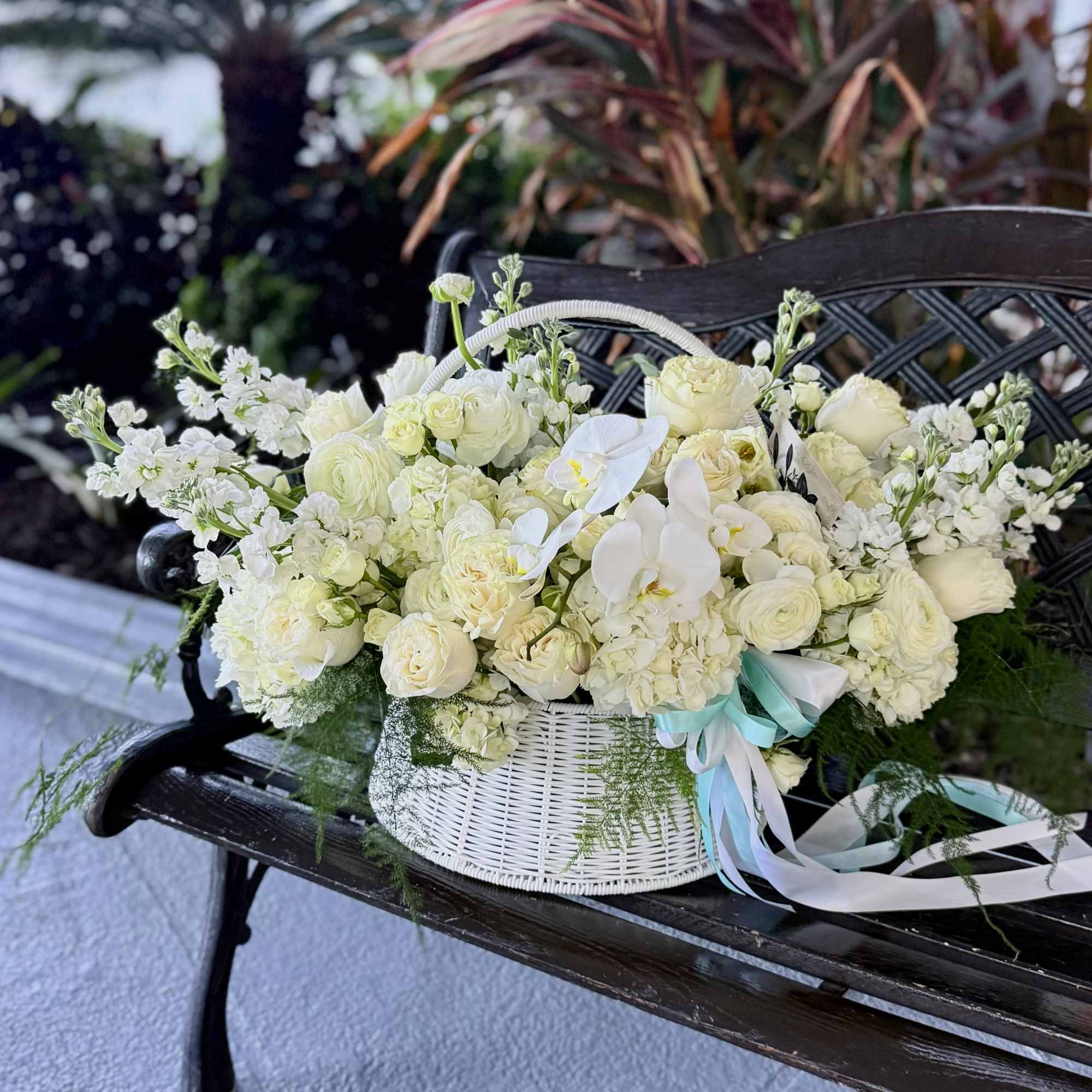 A serene, garden-fresh statement, this large low basket arrangement-ideal as a sympathy