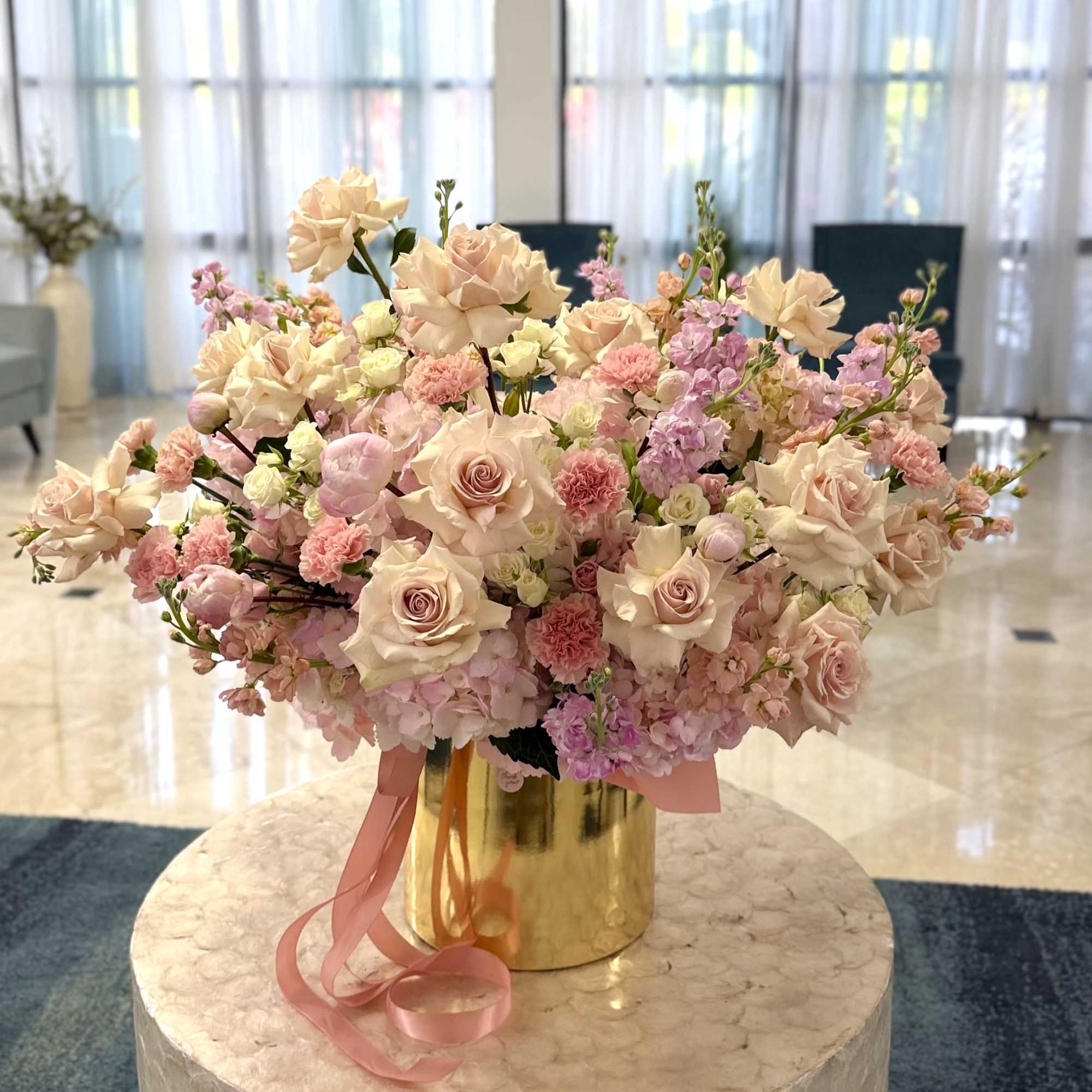 A pastel-rich bouquet that reads like a sunlit garden - the Miami