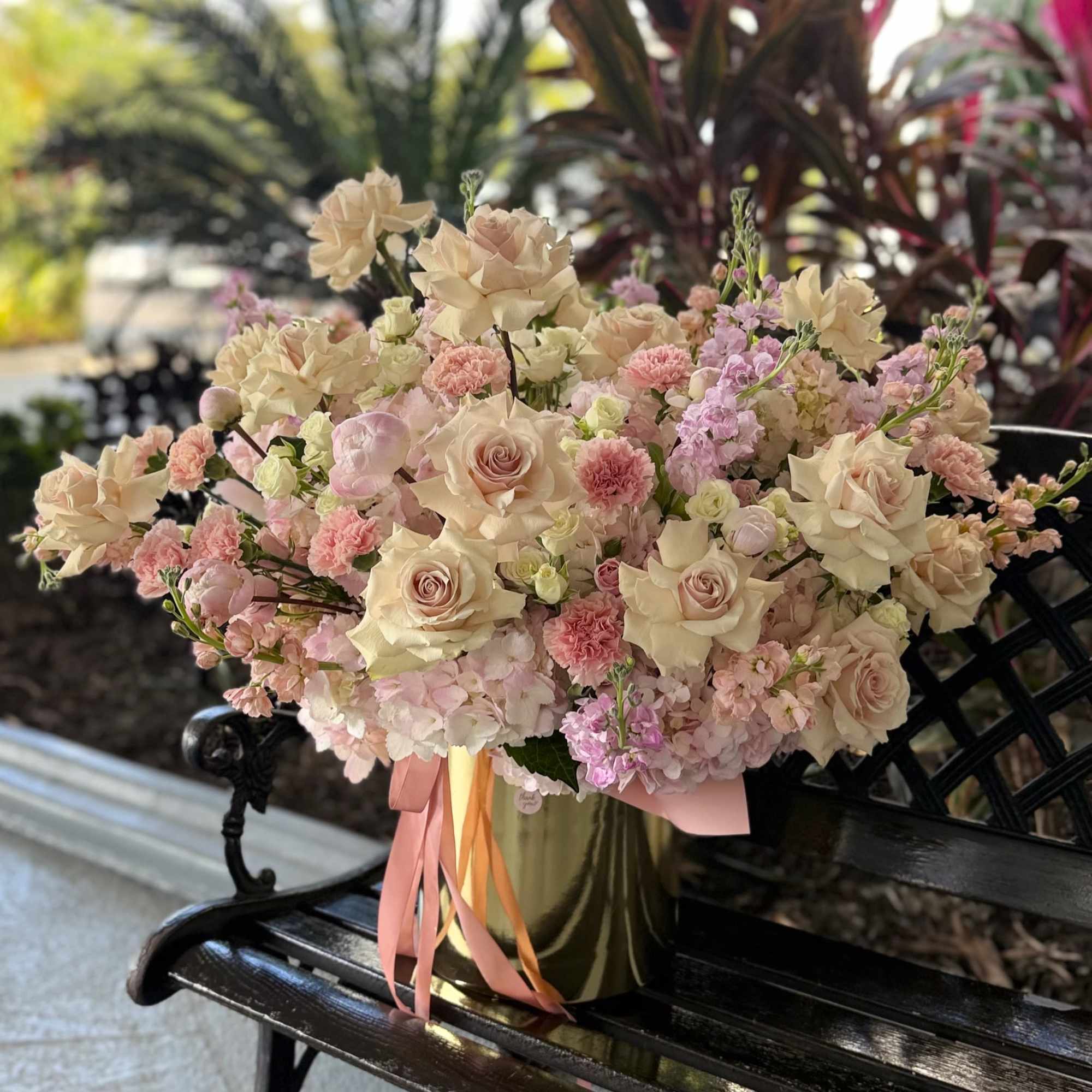 A pastel-rich bouquet that reads like a sunlit garden - the Miami