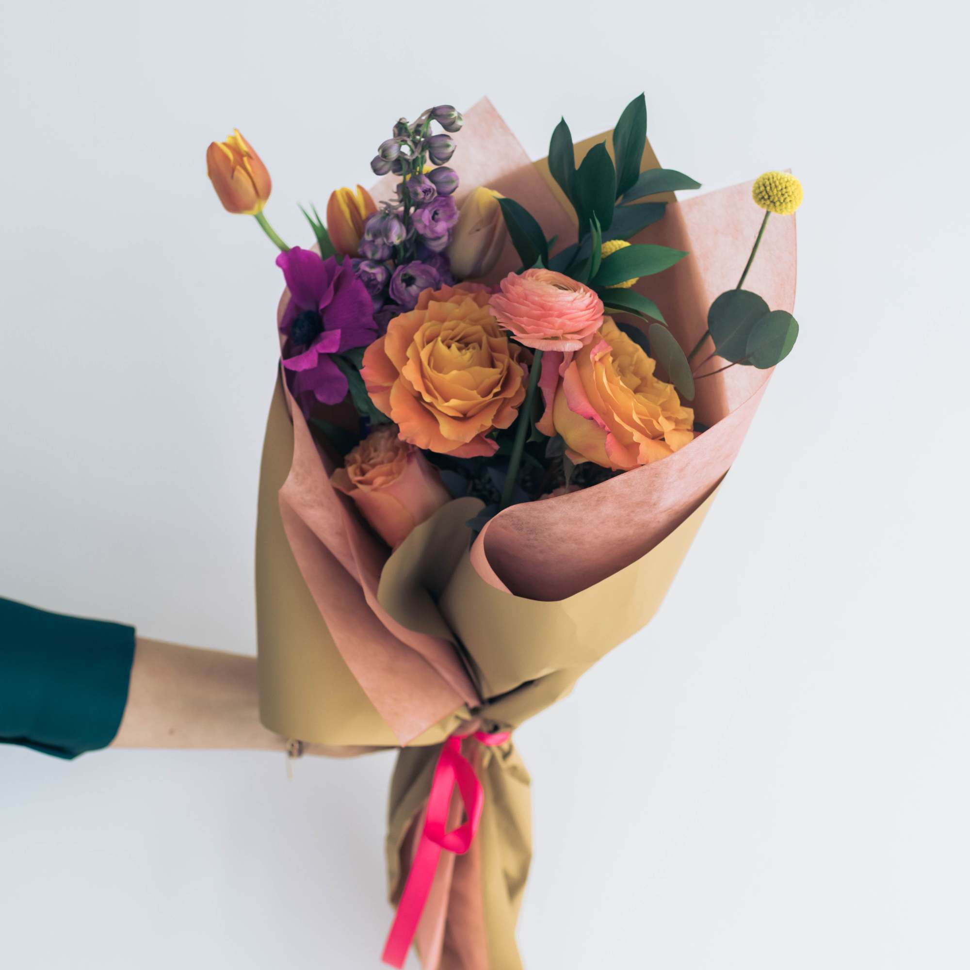 Mix of Fall color palette wrapped bouquet. Flowers may differ from the