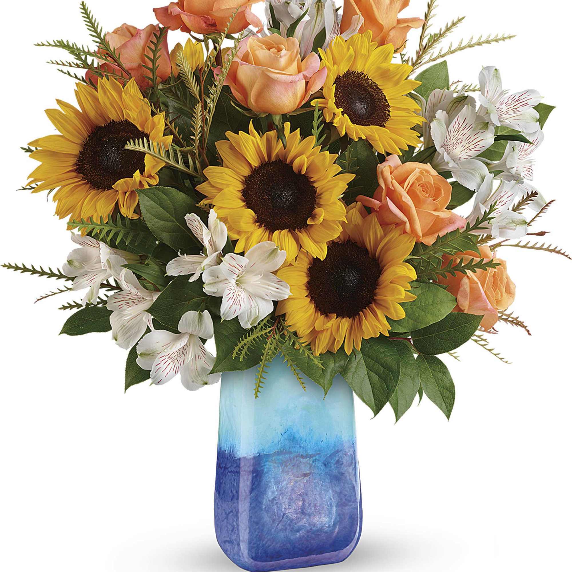 Sunflowers, peach roses, and white alstroemeria in a blue glass vase