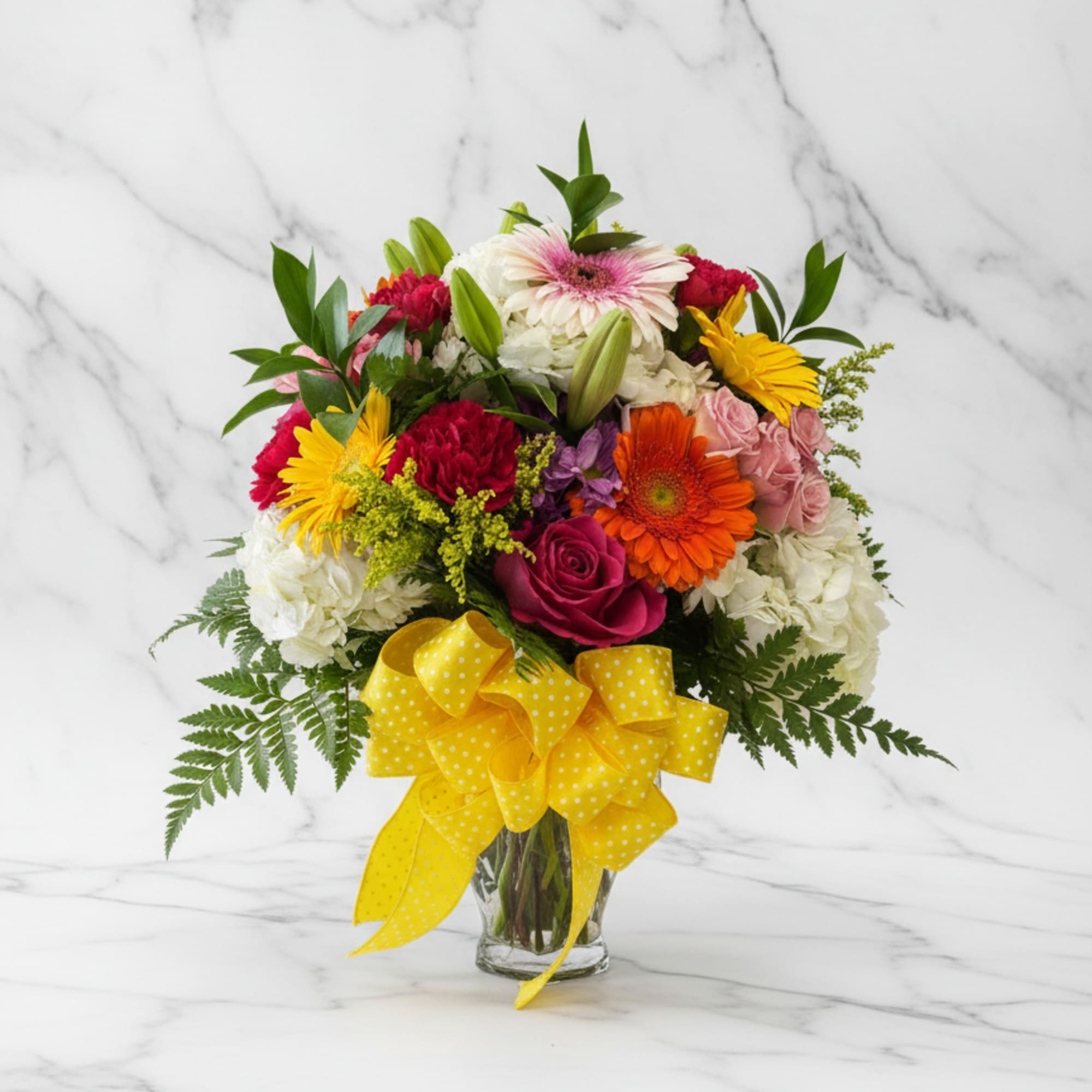 Brighten any day with this vibrant vase arrangement, bursting with white hydrangeas
