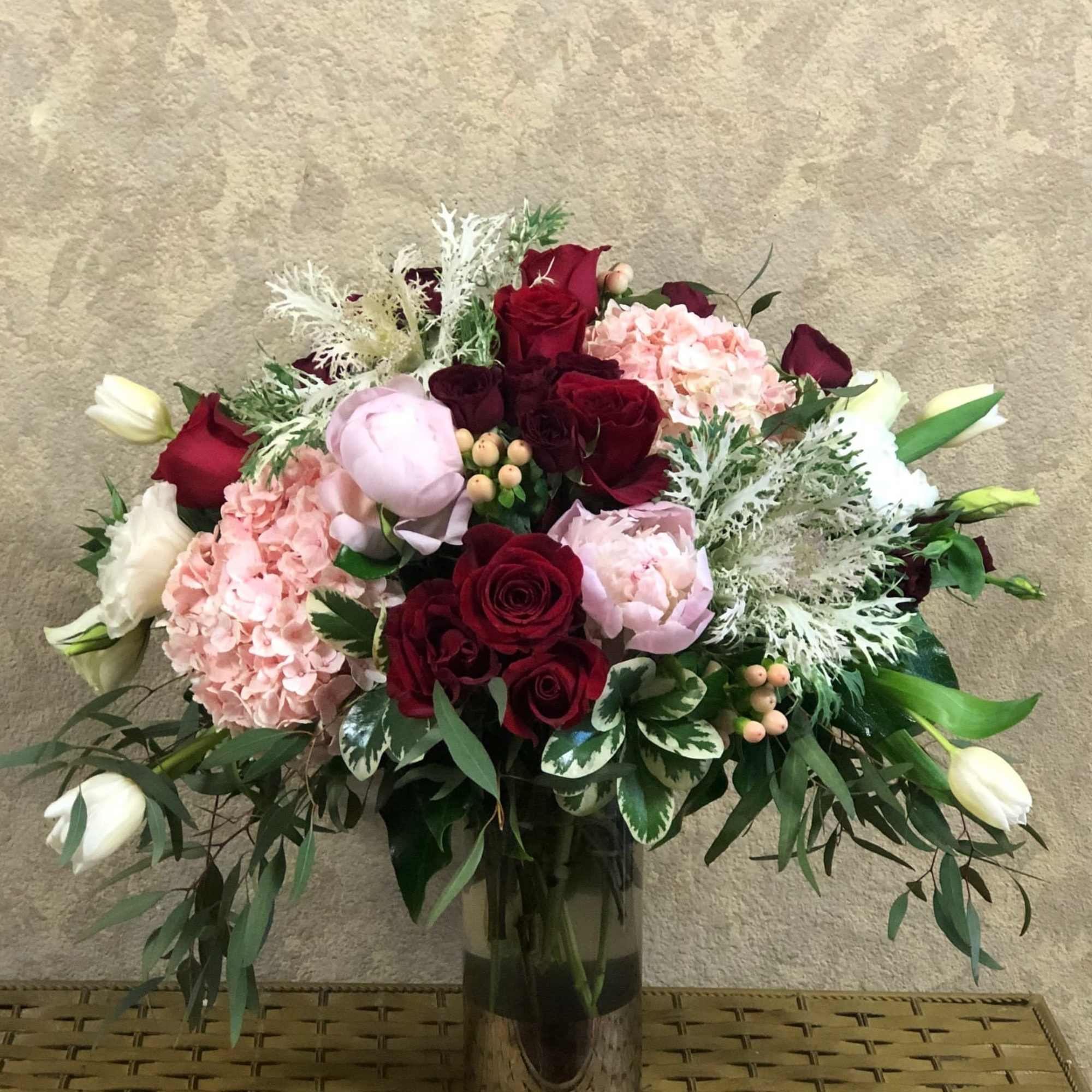 Type of Flowers: Pink Peonies, Pink Hydrangeas, Red Roses, White Lisianthus, White