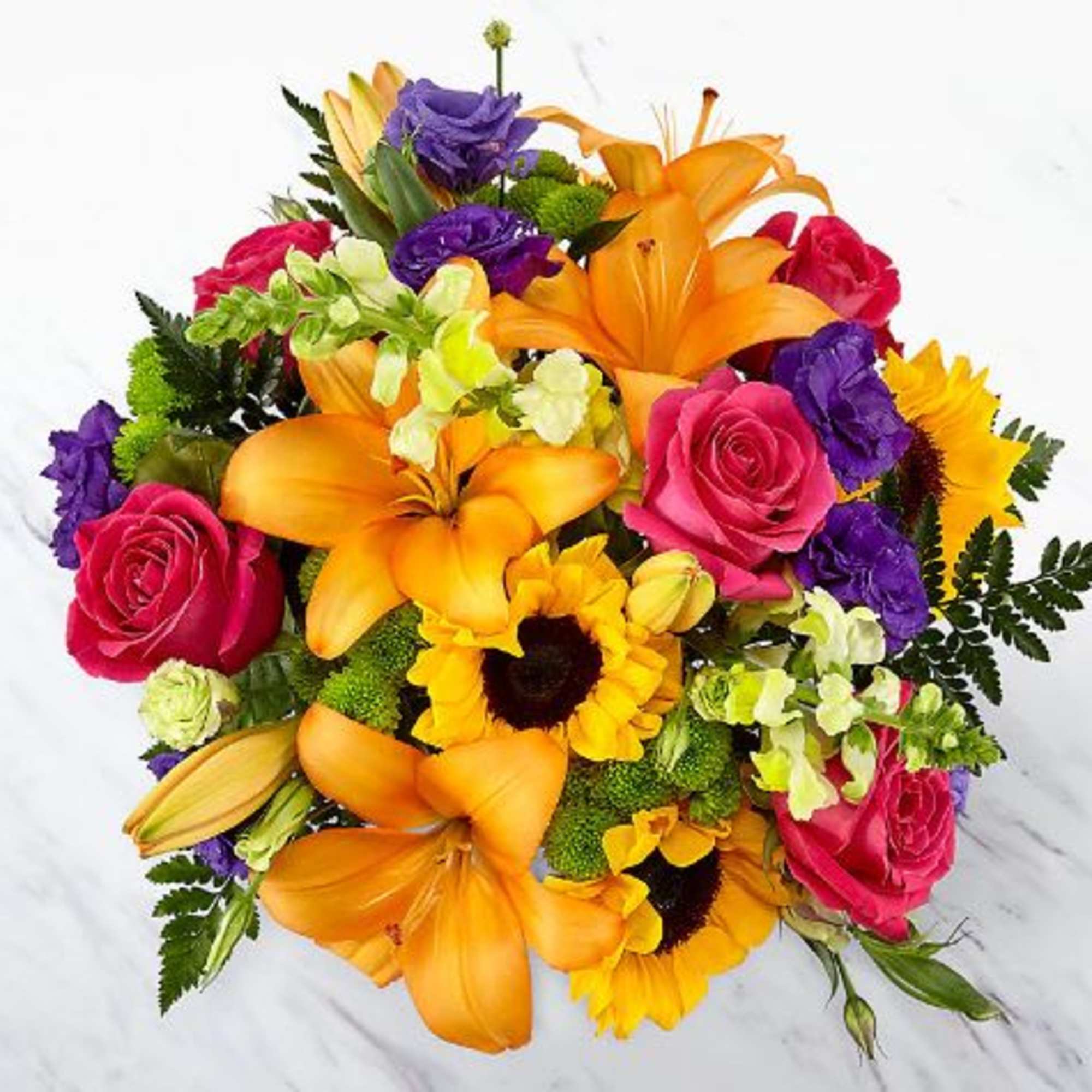 Bright mixed bouquet with lilies, roses, and sunflowers