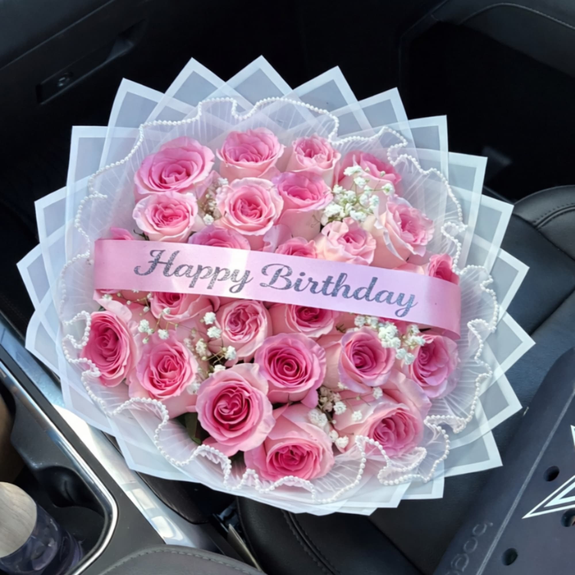 Pink rose bouquet with a Happy Birthday ribbon