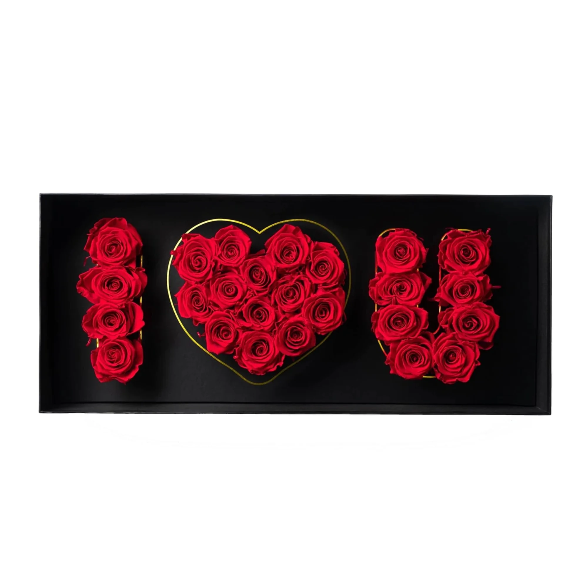 Red roses arranged in a heart and the letters I and U in a black box