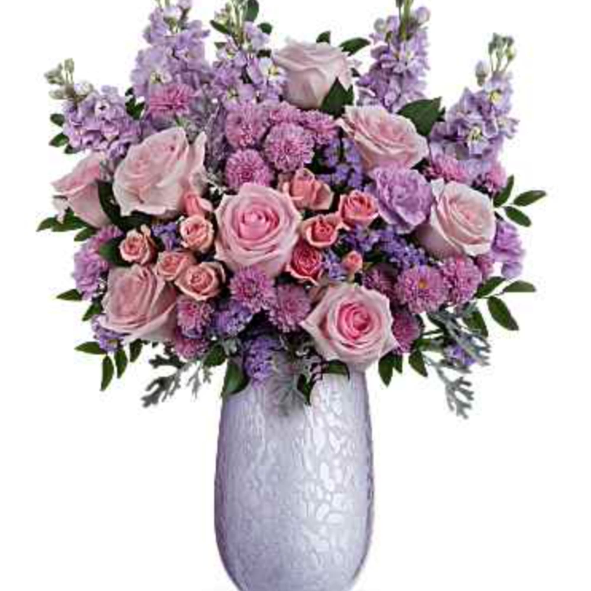What a treat! Overflowing with pink roses and lavender blooms, this stunning