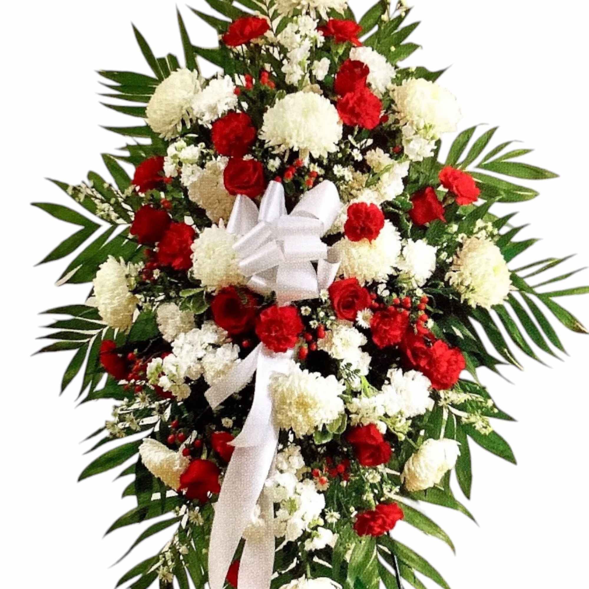 Standing funeral spray of red and white flowers with a white bow