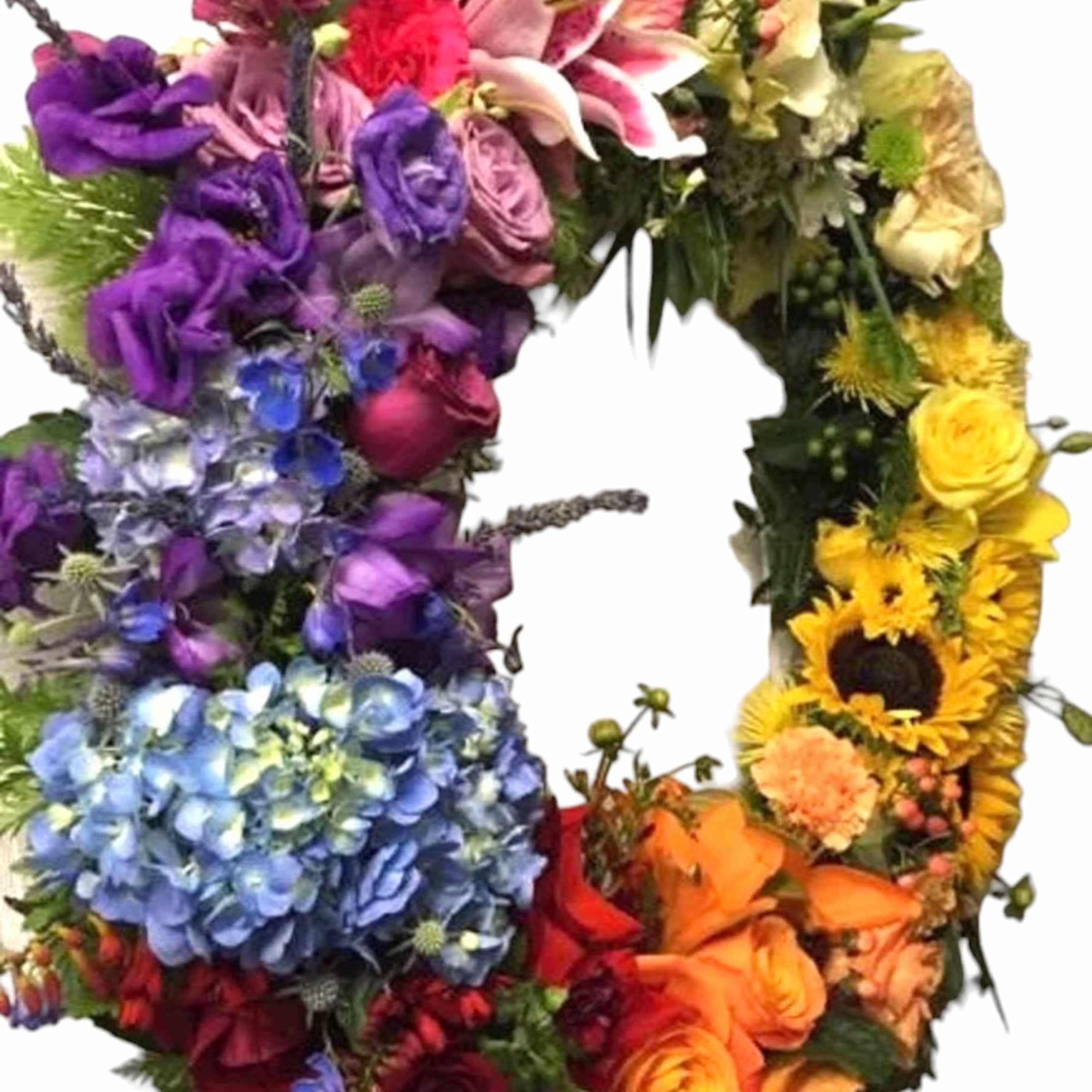 Colorful floral wreath with roses, lilies, hydrangeas, and sunflowers