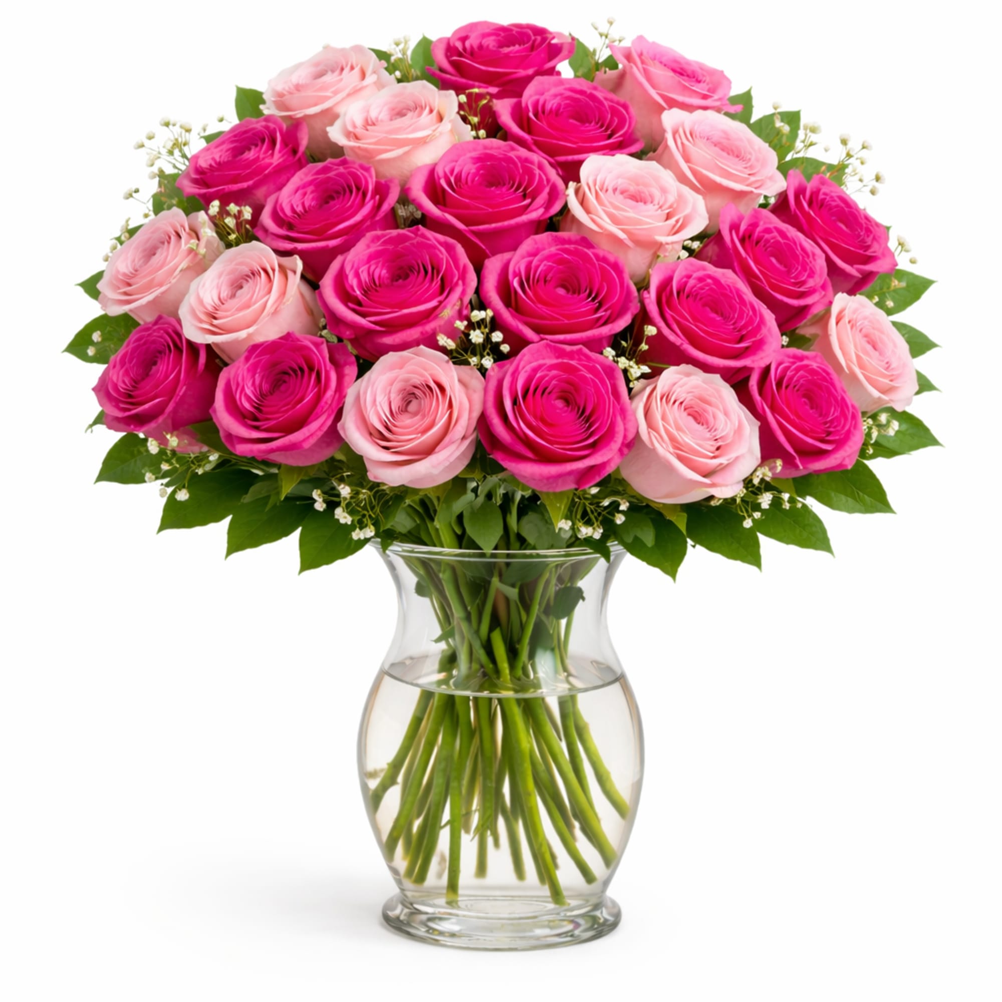 Pink and hot pink roses arranged in a clear glass vase