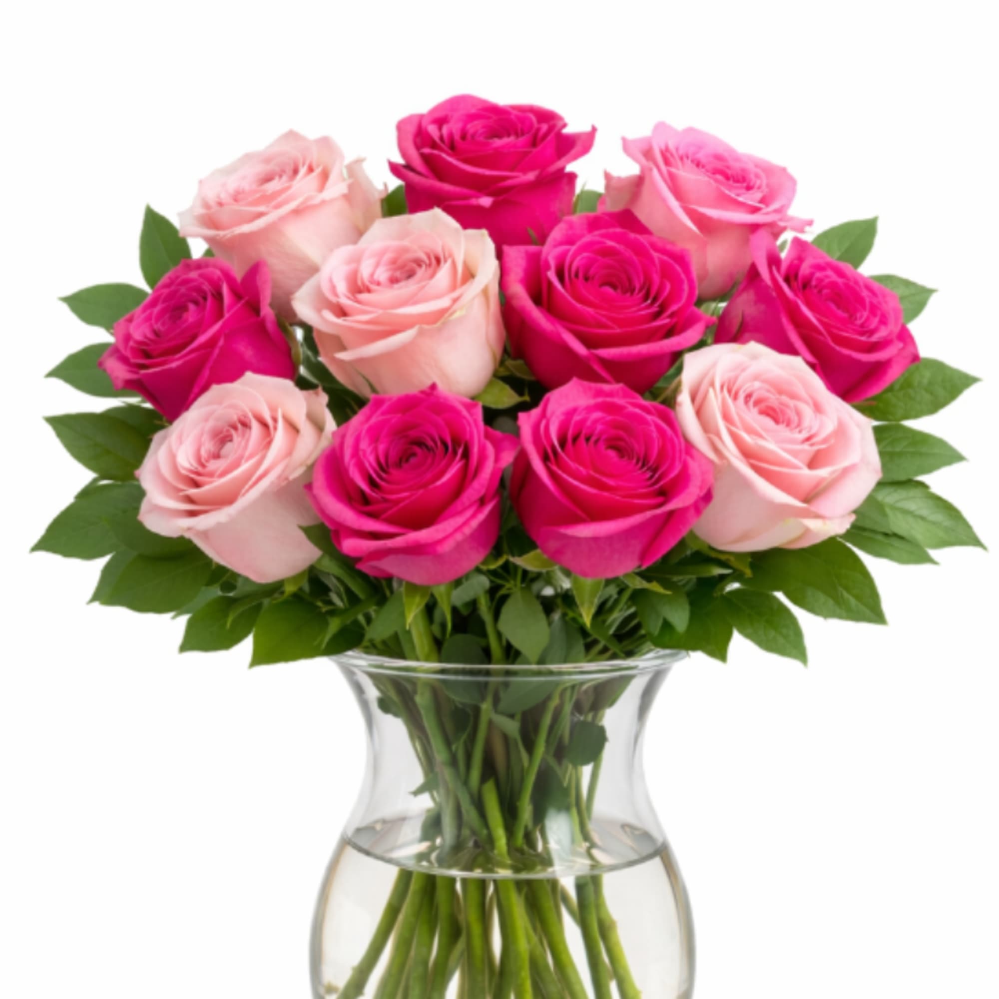 Pink and hot pink roses arranged in a clear glass vase