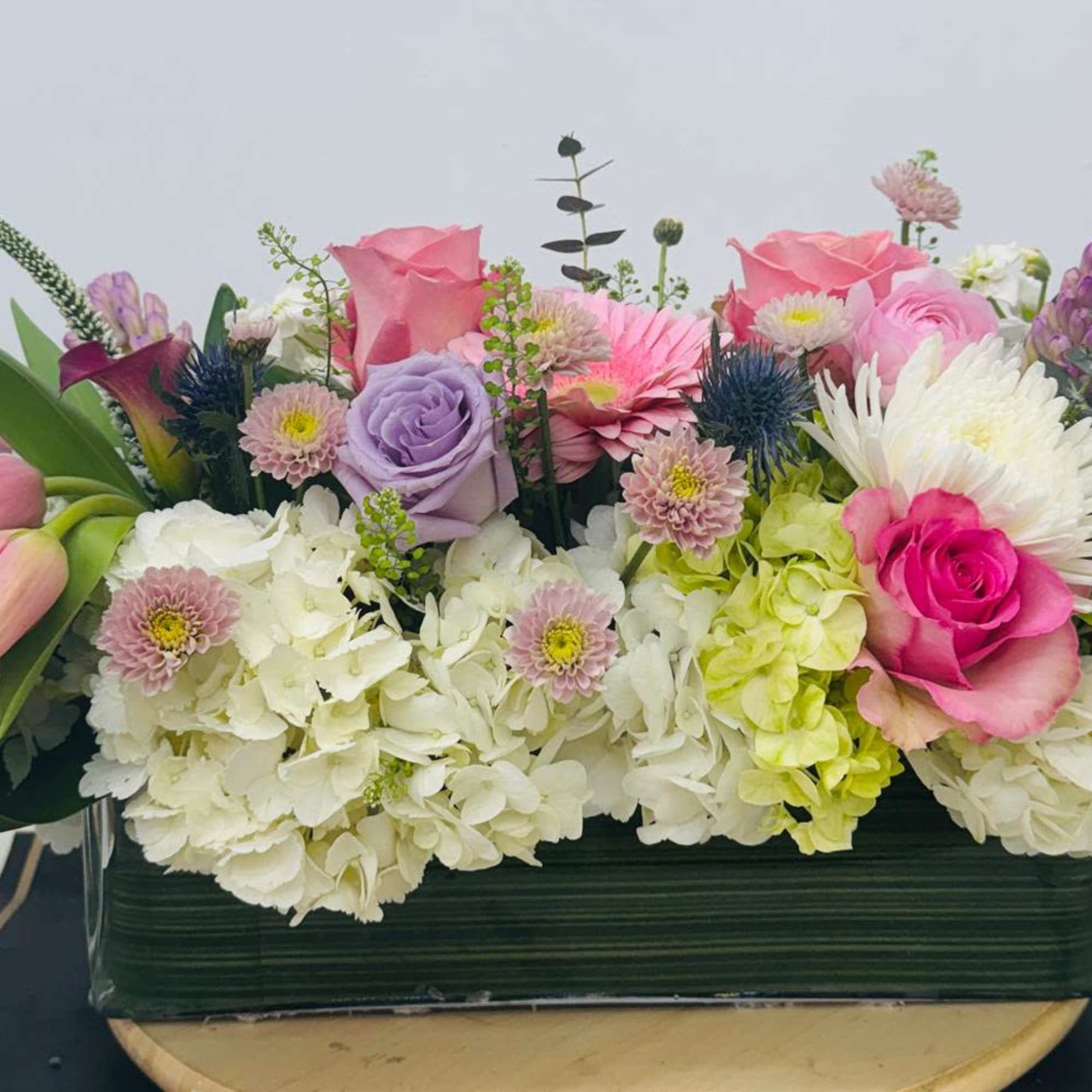 Vase
Roses
Tulips
Hydrangeas
Dusty miller
Differents Flowers
