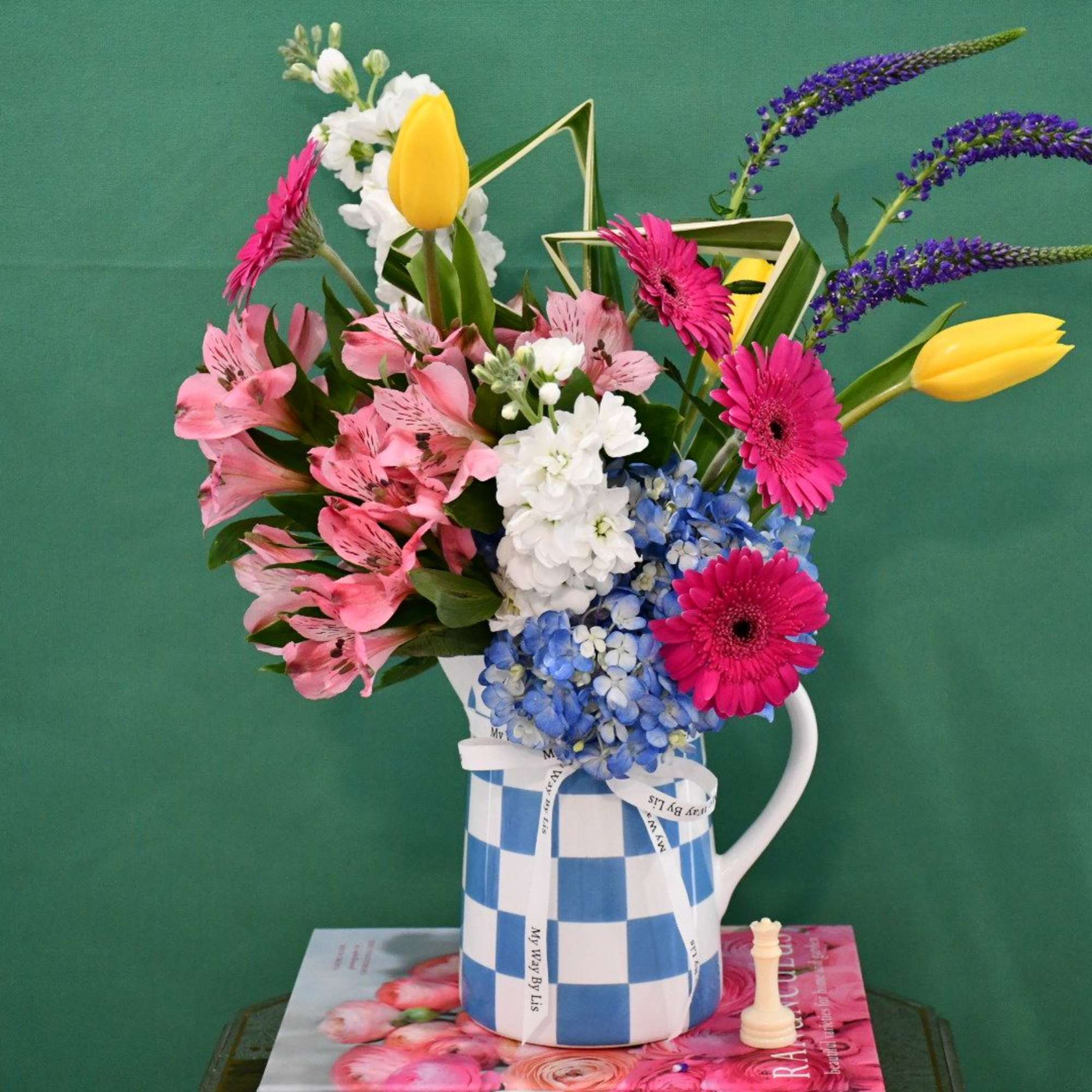 Cheerful and colorful arrangement in one of our favorite vases!