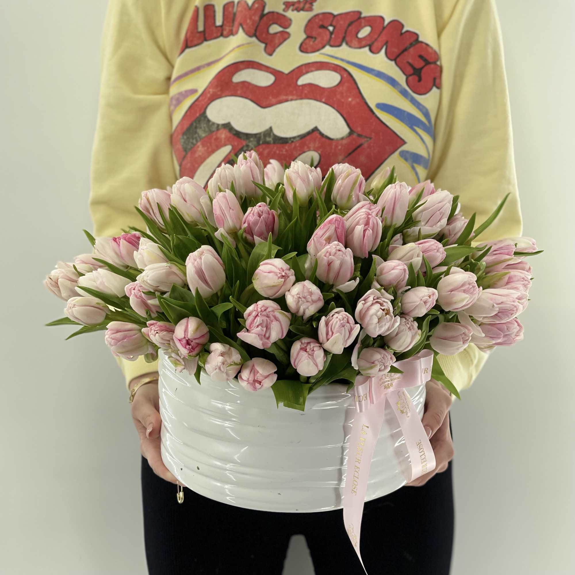Pink tulip bouquet in a white round box with a pink ribbon