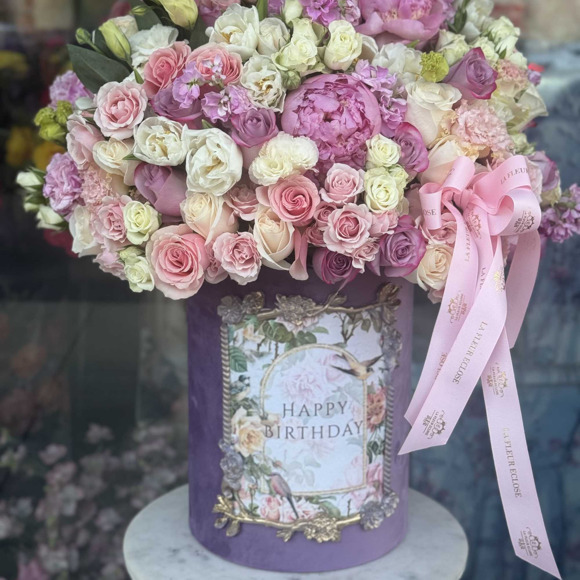 Pink and white rose bouquet in a purple birthday box with a ribbon, photo 2 of 3