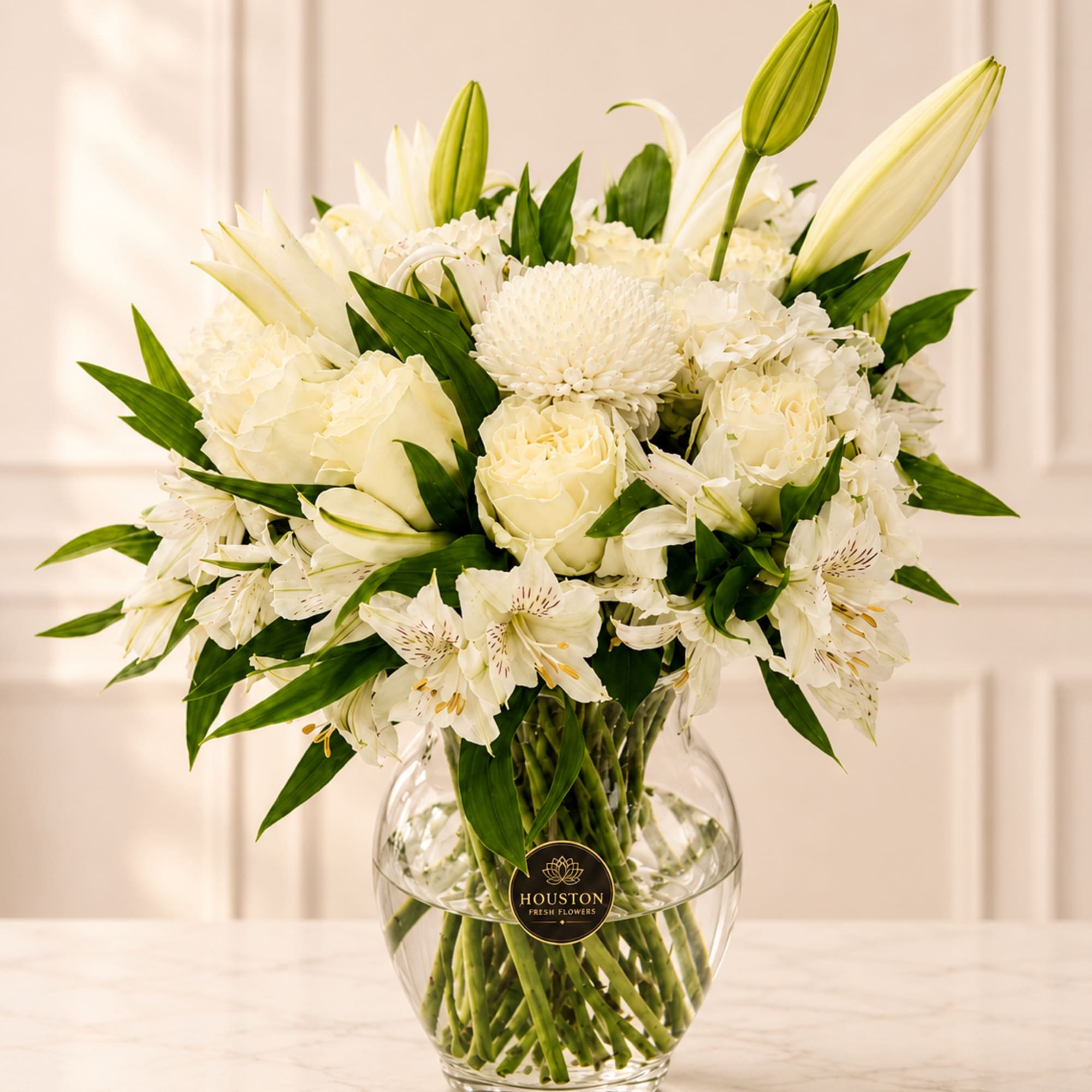Beautiful white bouquet with different types of flowers.
