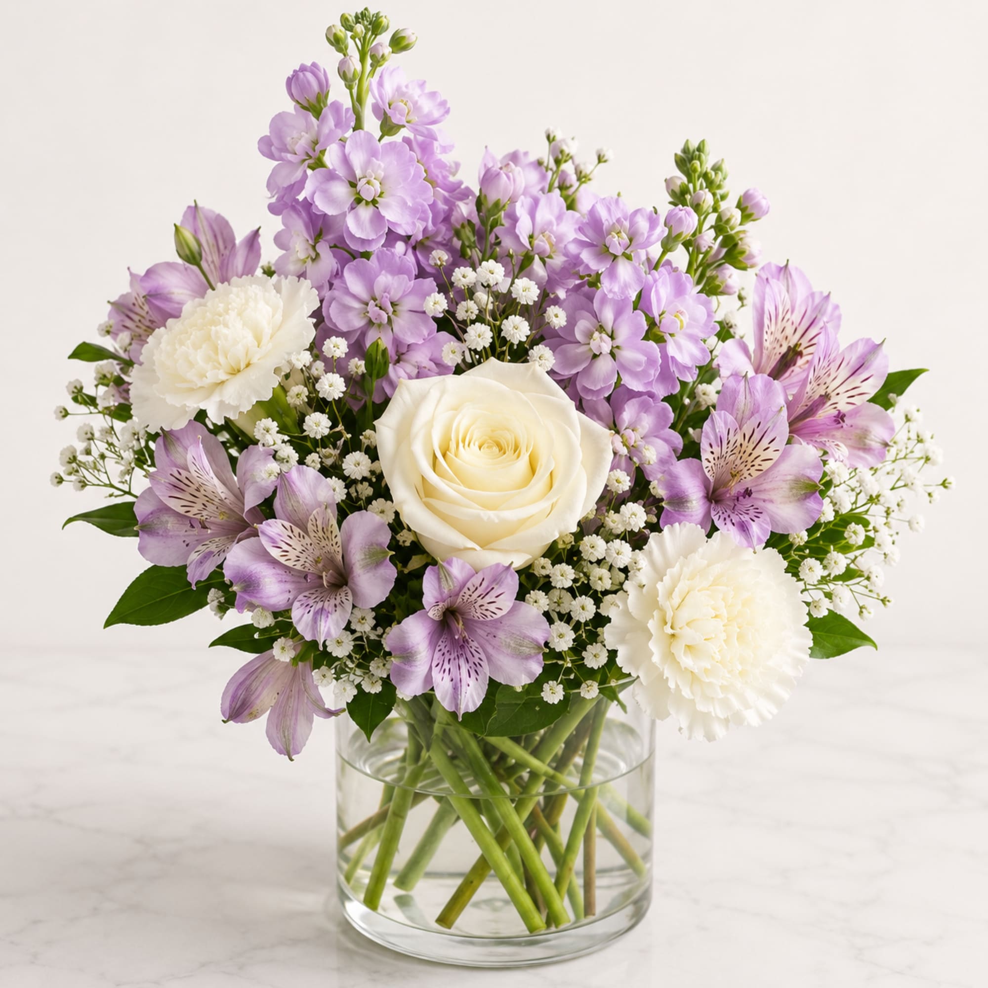 Elegant, peaceful, and timeless, Lavender Grace Bouquet&trade; showcases a beautiful blend of