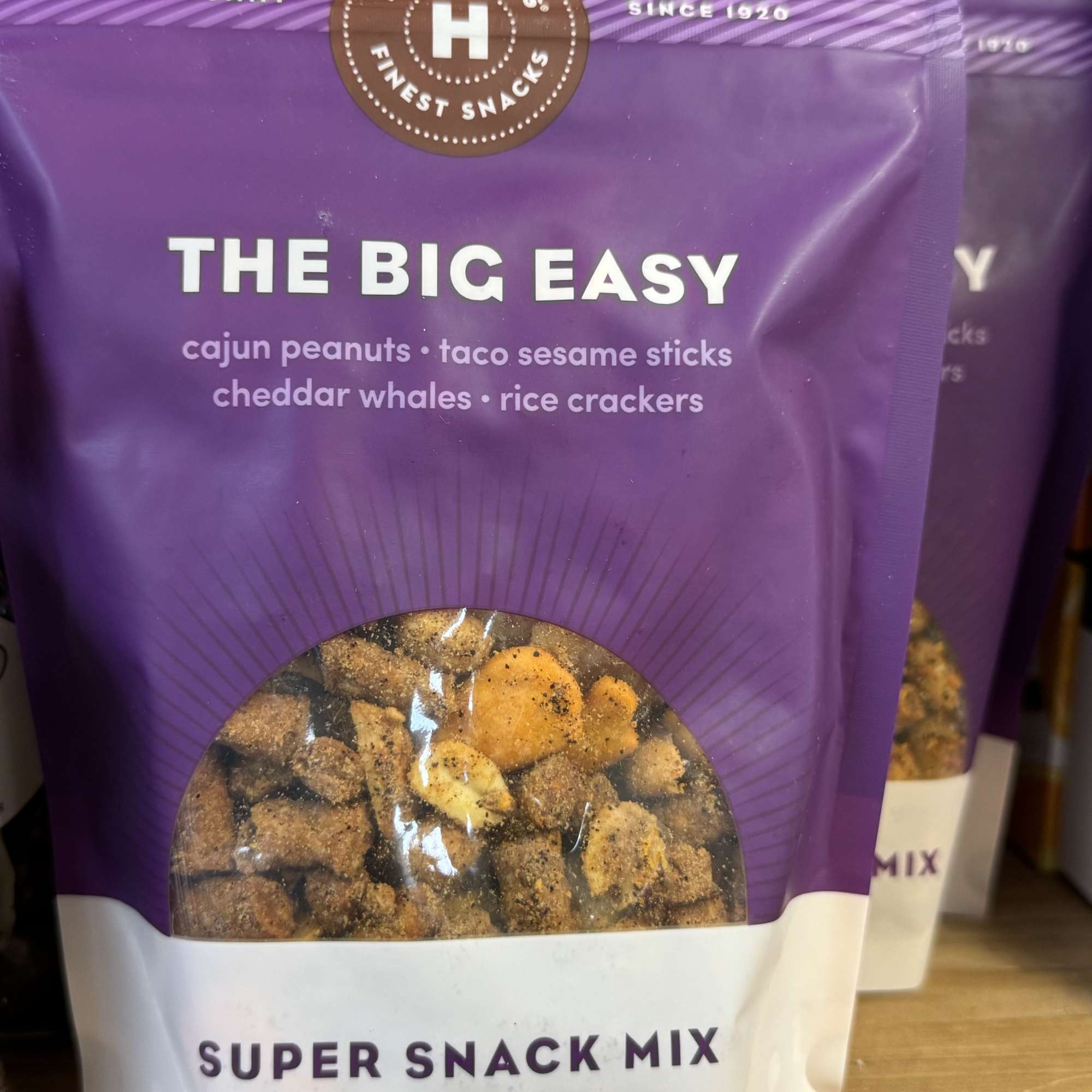 Purple bag of Hammond's Super Snack Mix on a shelf