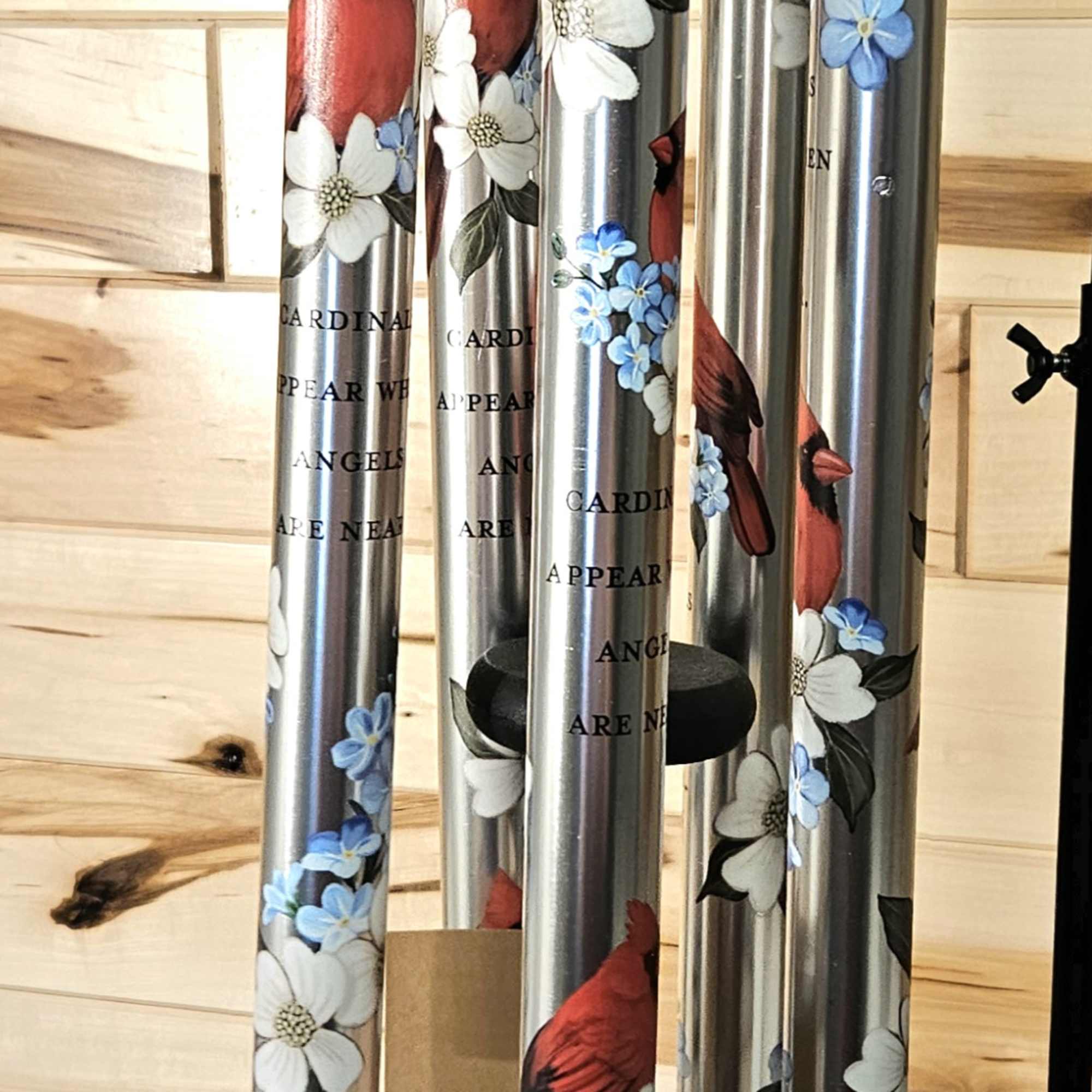 Hanging metal wind chime with cardinal and flower designs