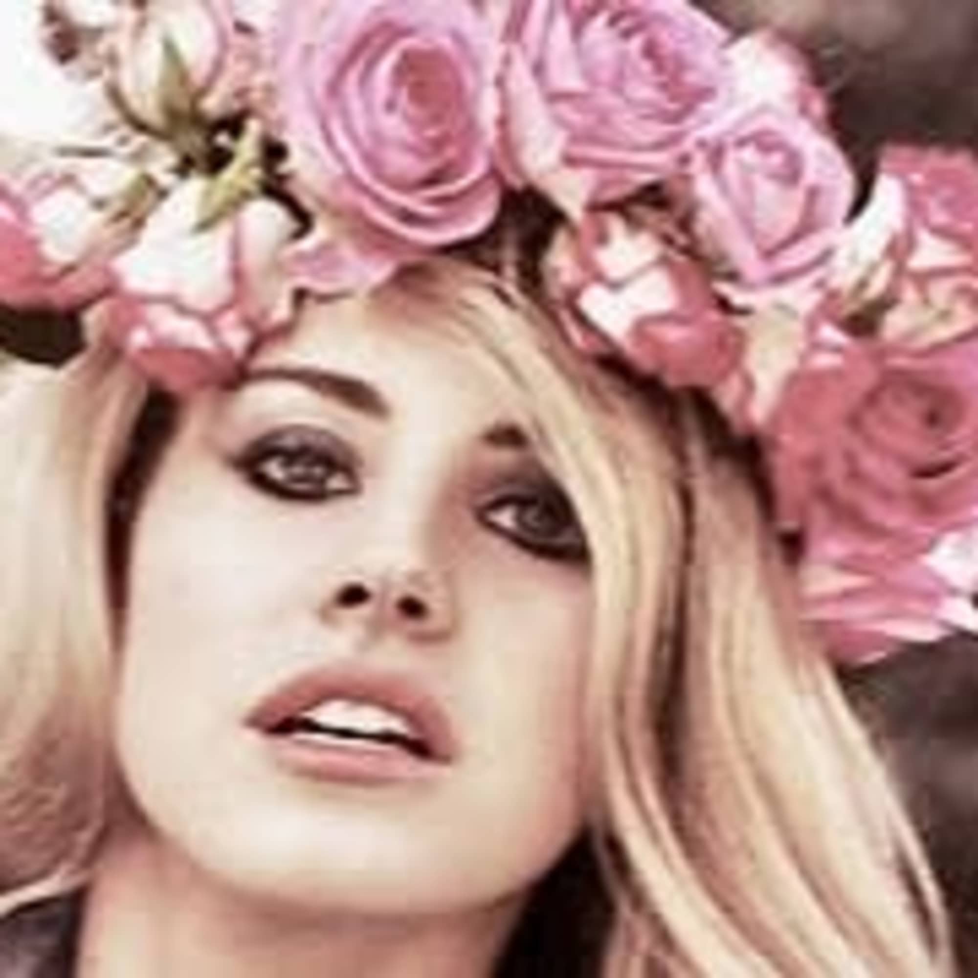 Woman wearing a pink rose flower crown