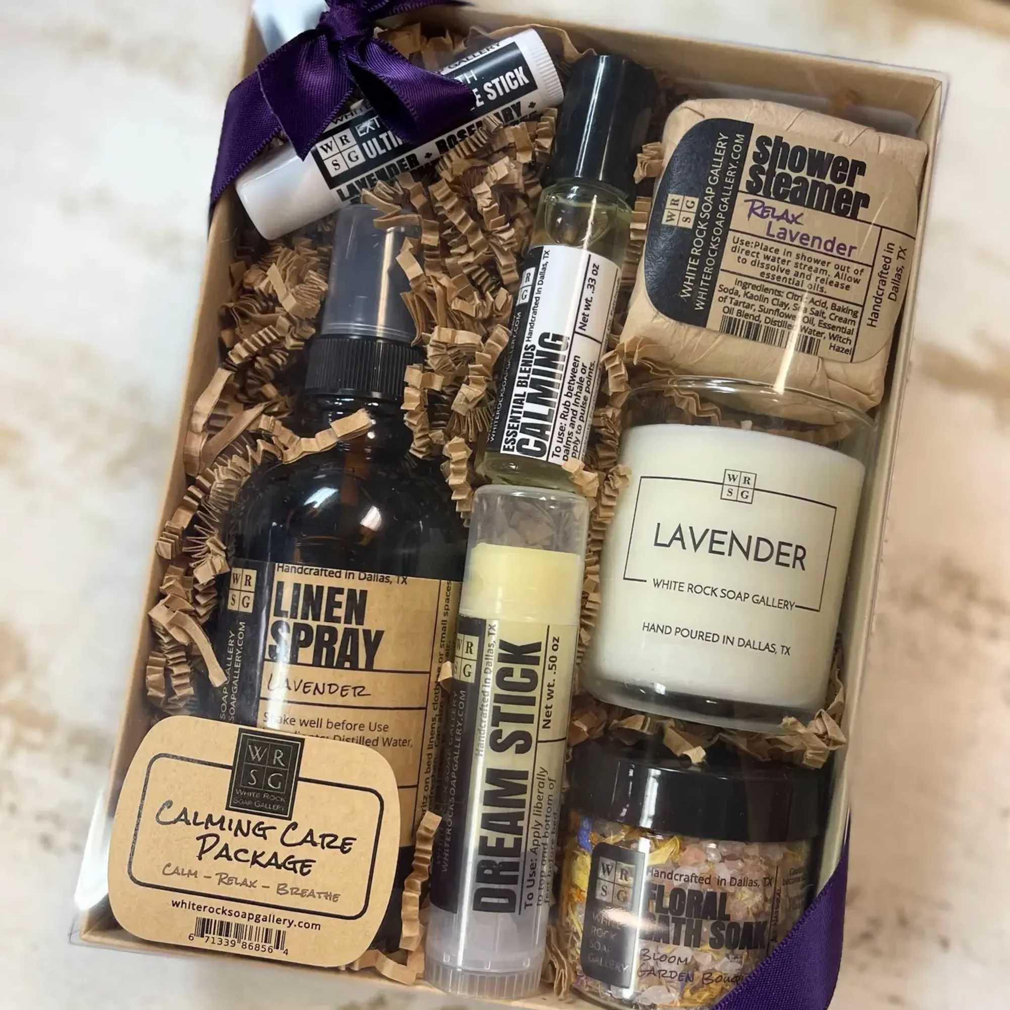Lavender-themed self-care gift box with soap, spray, and balm