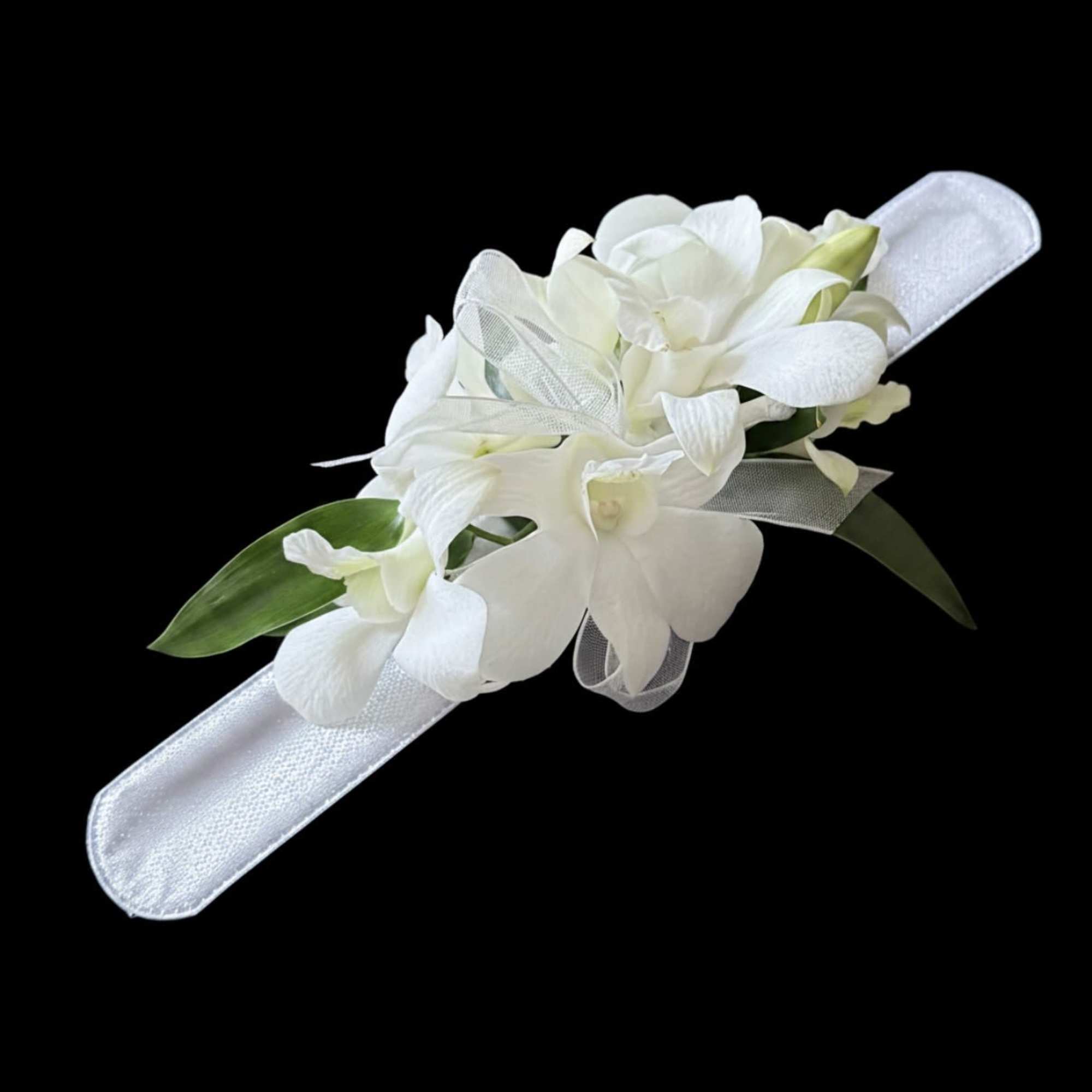 White dendrobium orchid corsage on snap on bracelet