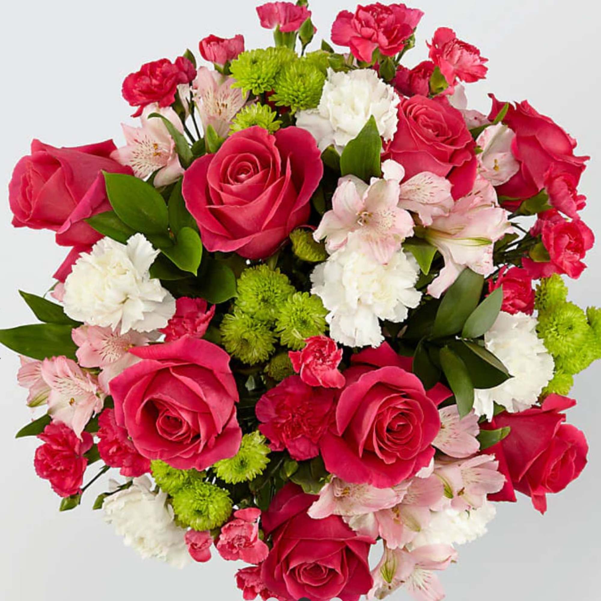 Bouquet of pink roses, white carnations, and green pompons