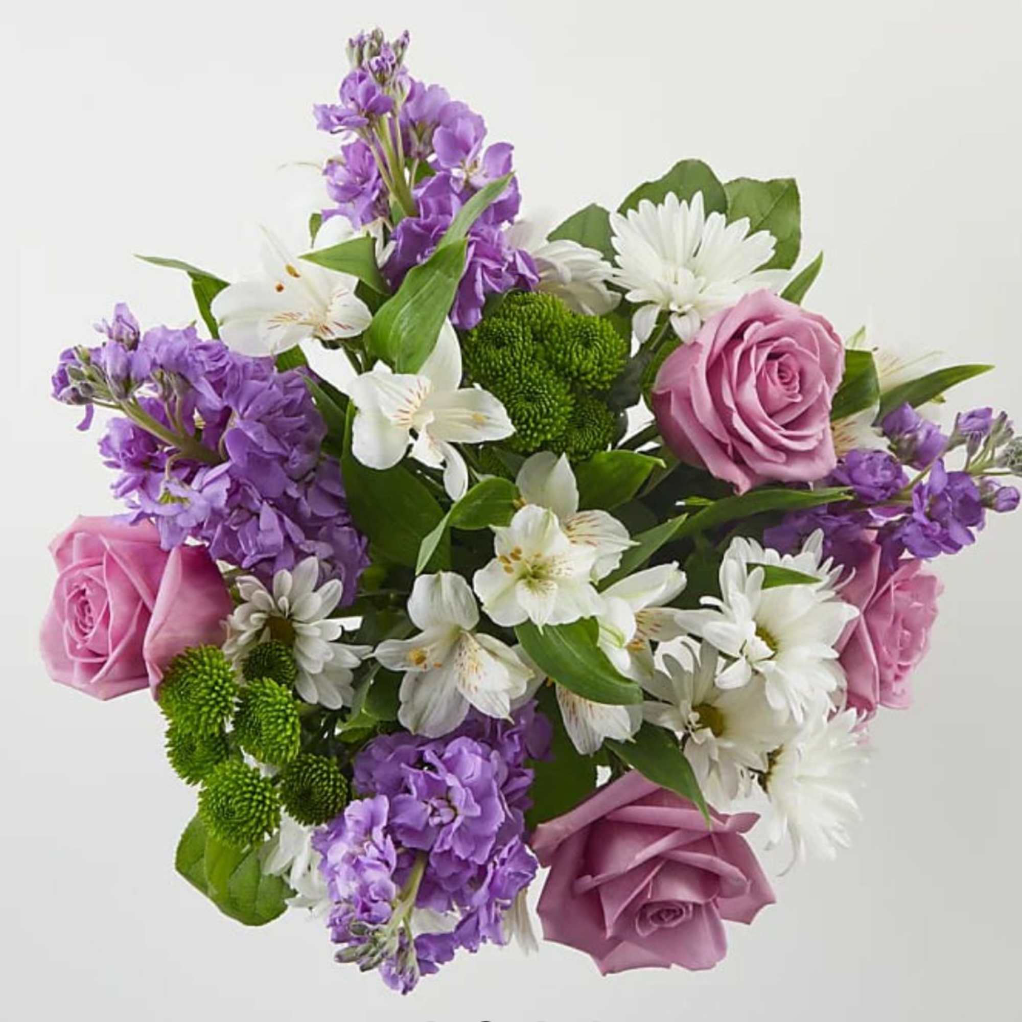 Bouquet of pink roses, white daisies, and purple flowers