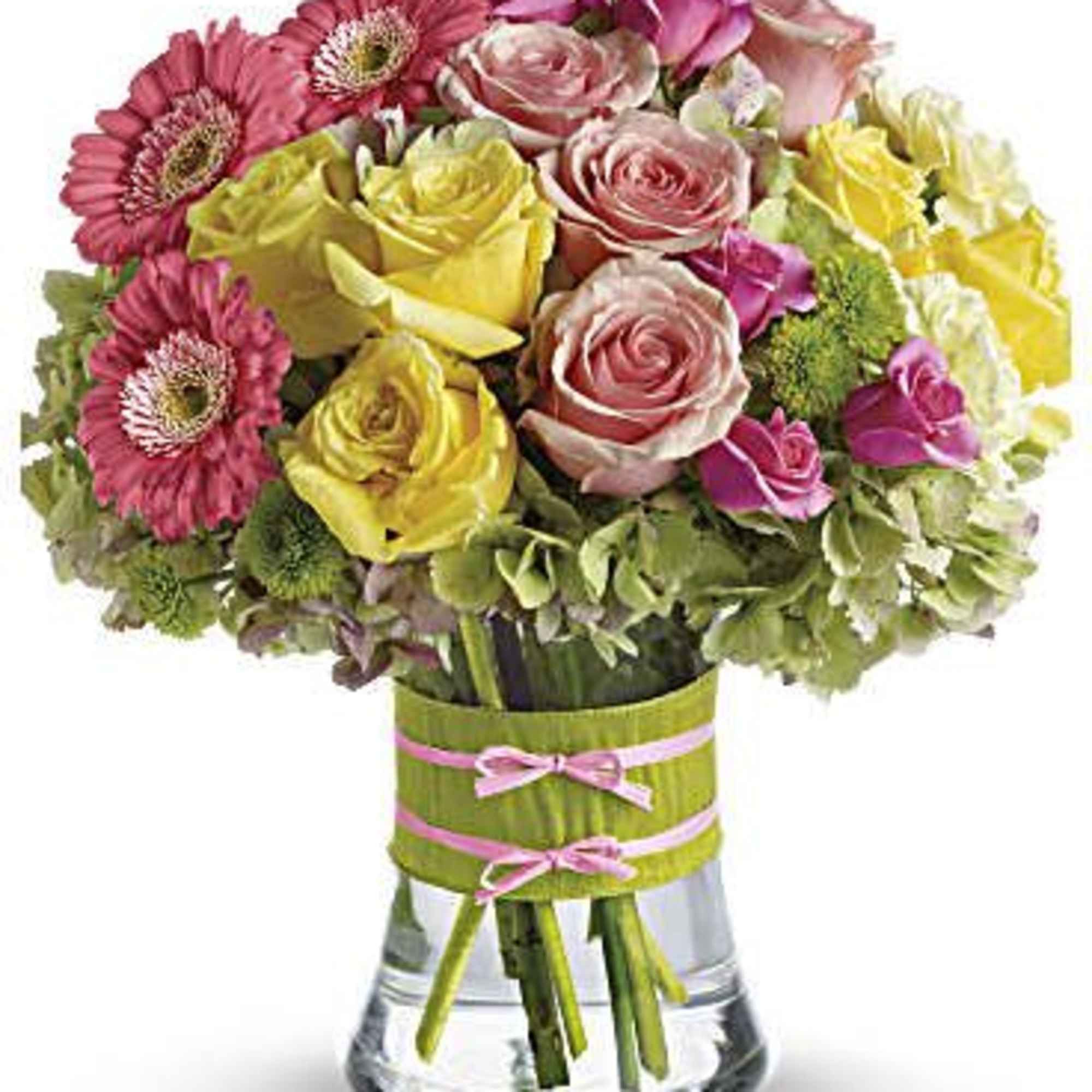 Mixed pink and yellow bouquet in a clear glass vase