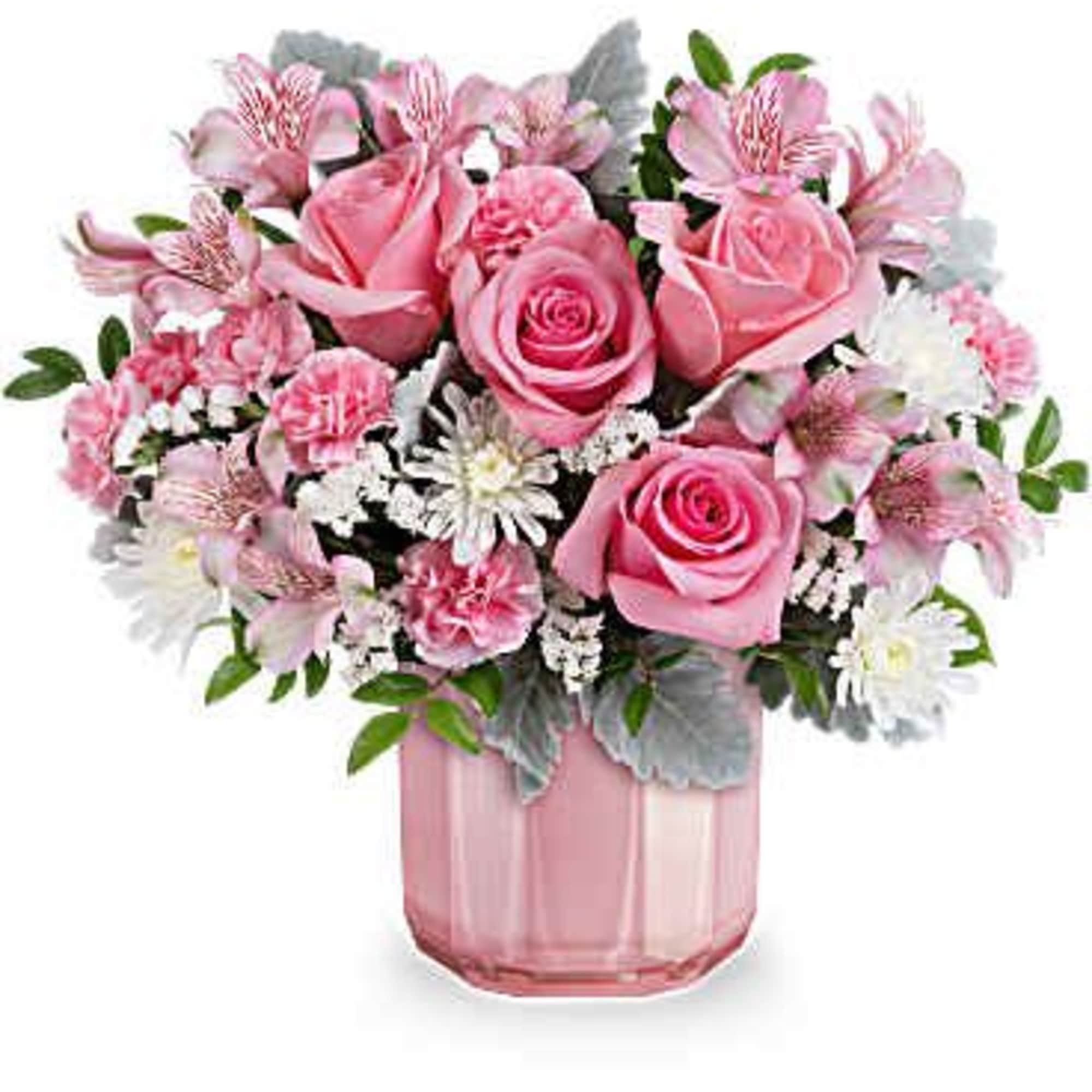Pink roses and mixed pink-white flowers in a pink glass vase
