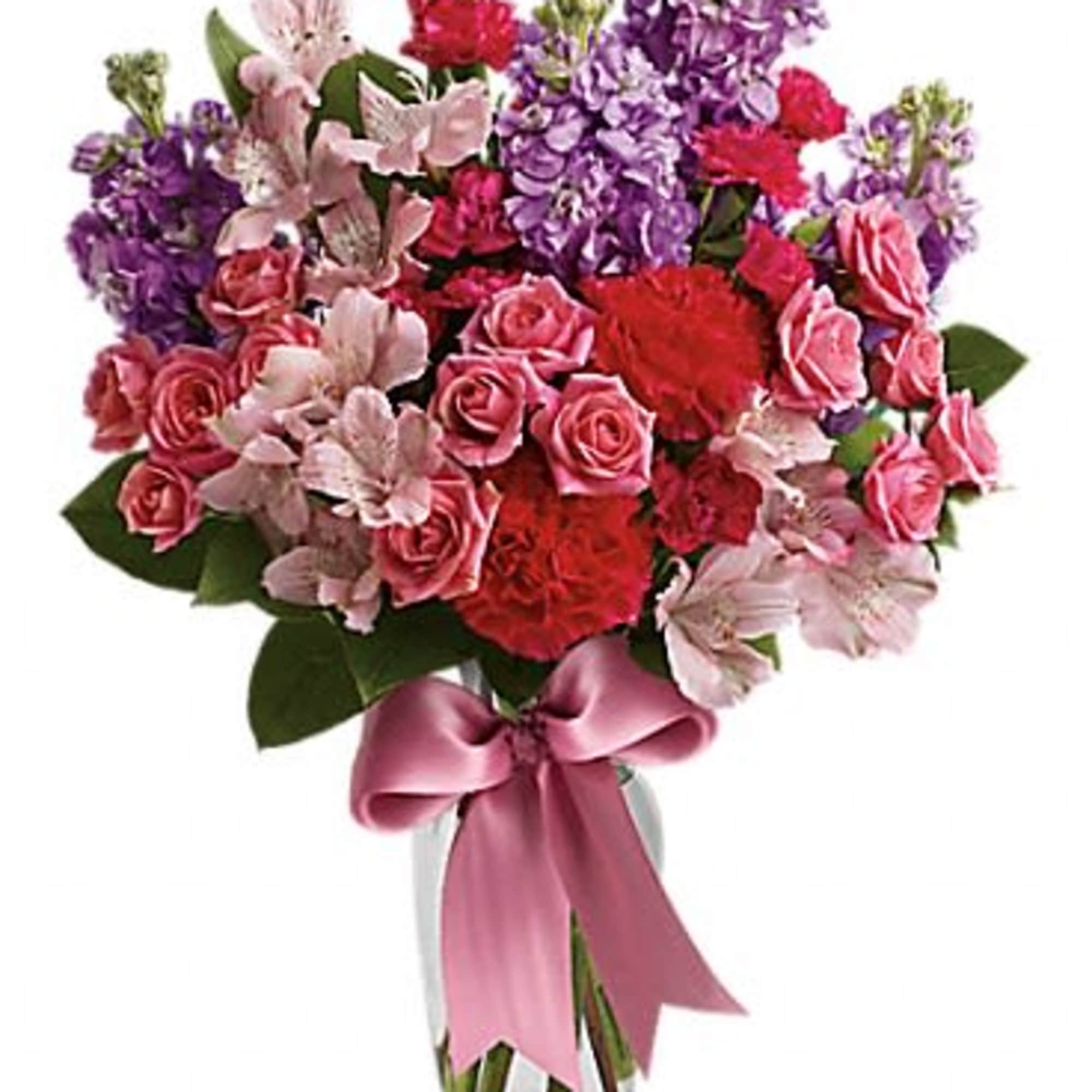 Pink and purple mixed bouquet in a glass vase with a satin ribbon